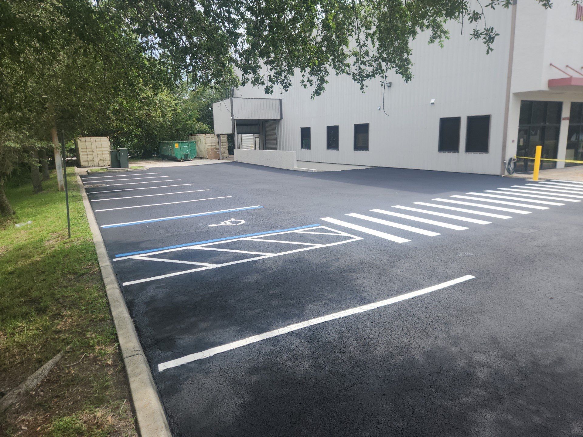 Delivery by Design Gets a Fresh Look: Sealcoating & Striping by Everline Coatings & Services - Southwest FL