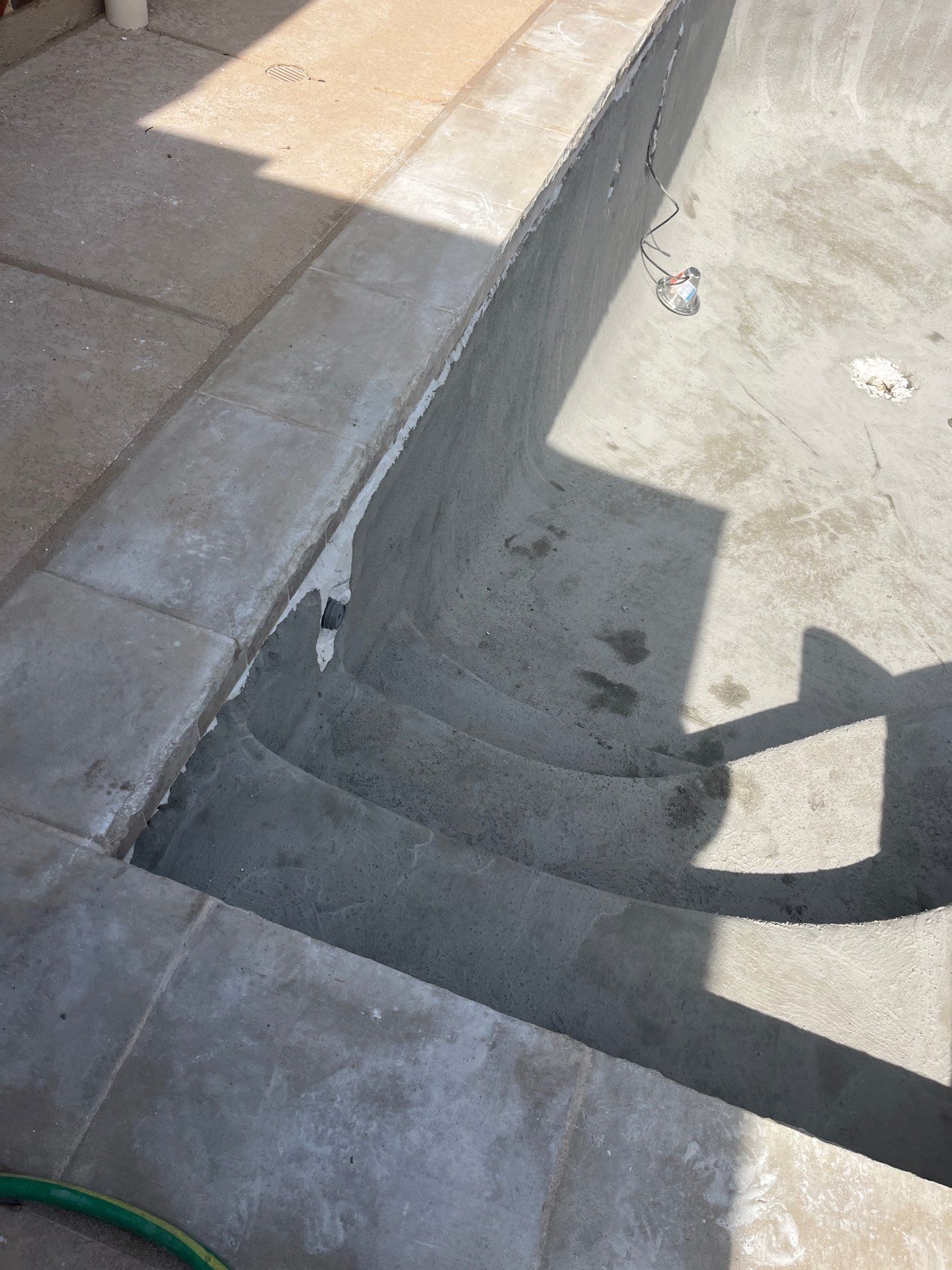Geometric Pool Remodel with Raised Stone Spa by Pinnacle Pools and Spas - DFW