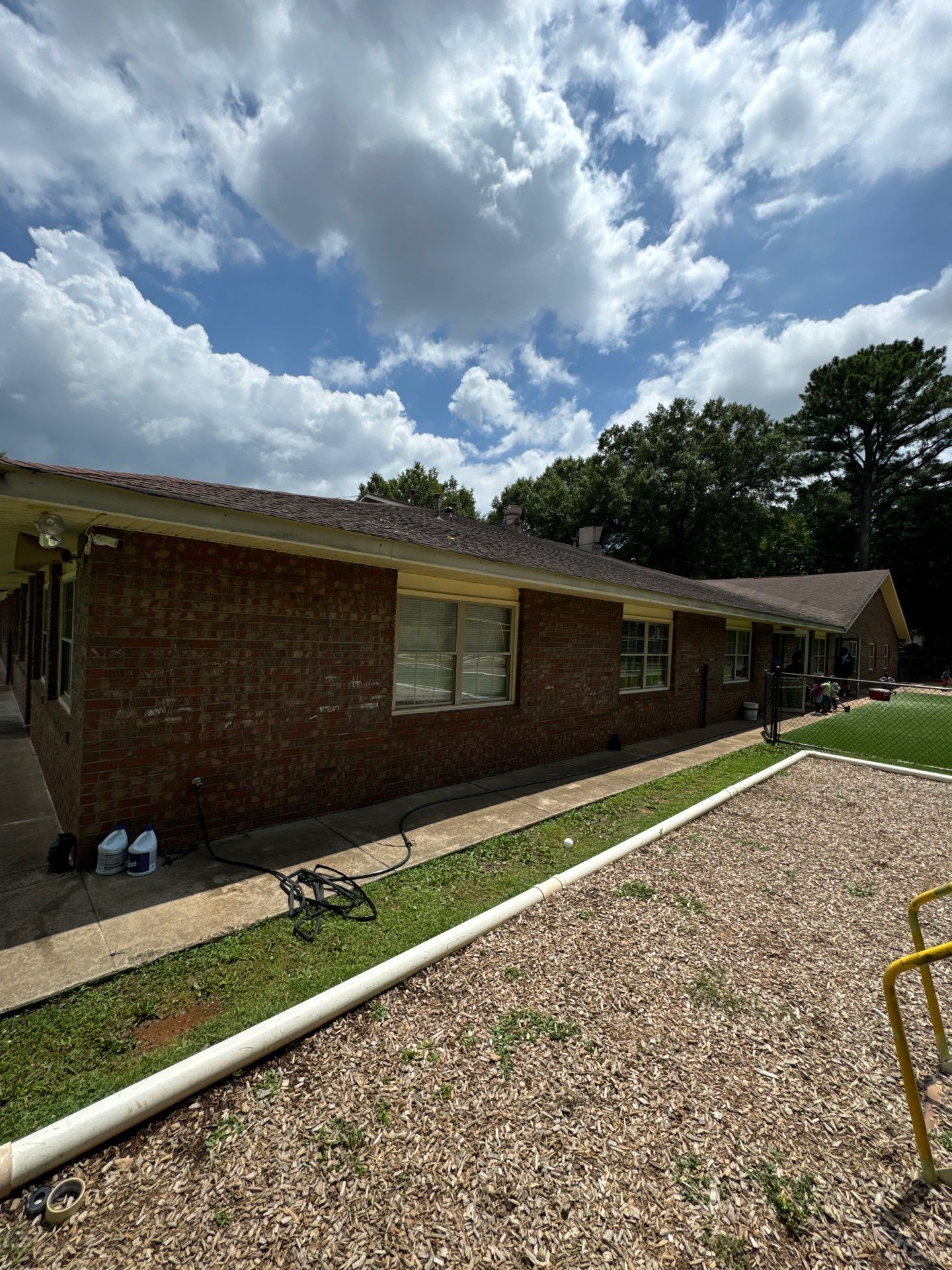 Commercial Exterior Brick and Stucco Painting in Fayetteville by Swift Home Renovations