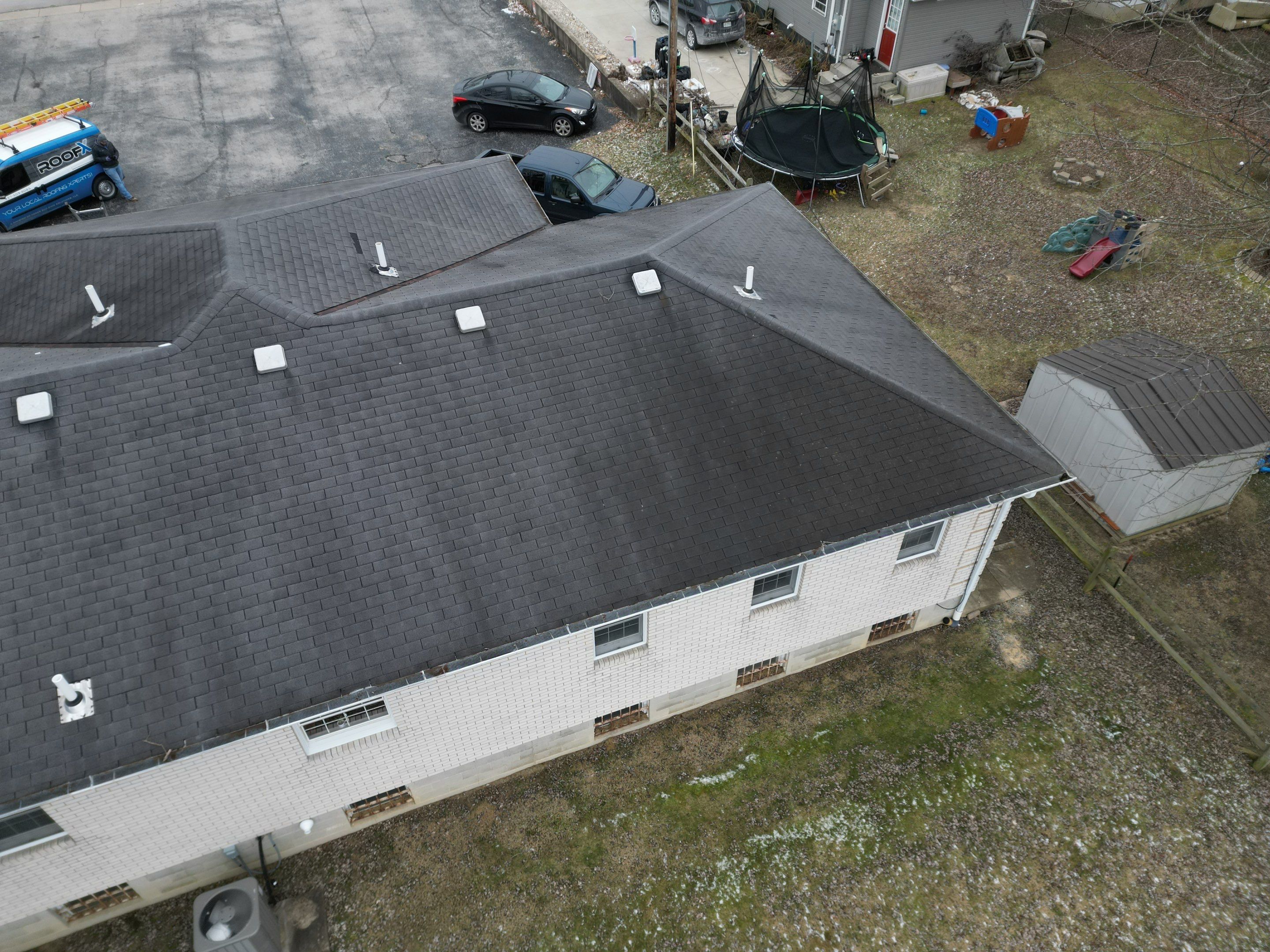 Commercial Roofing Installation using Performance Panel Metal - Frost Black by RoofX 