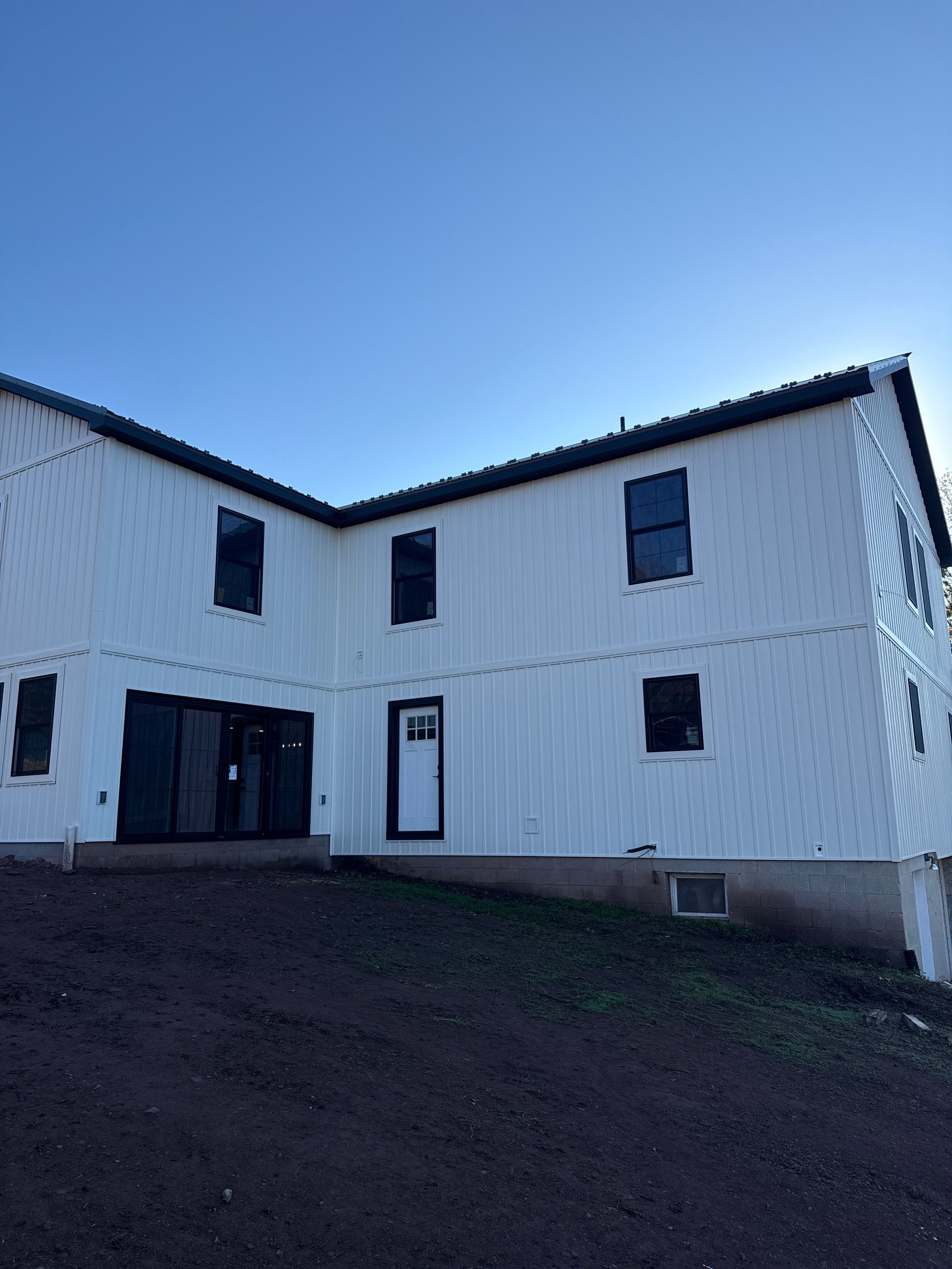 Two-Story Residential Addition and Exterior Transformation by Esh Builders