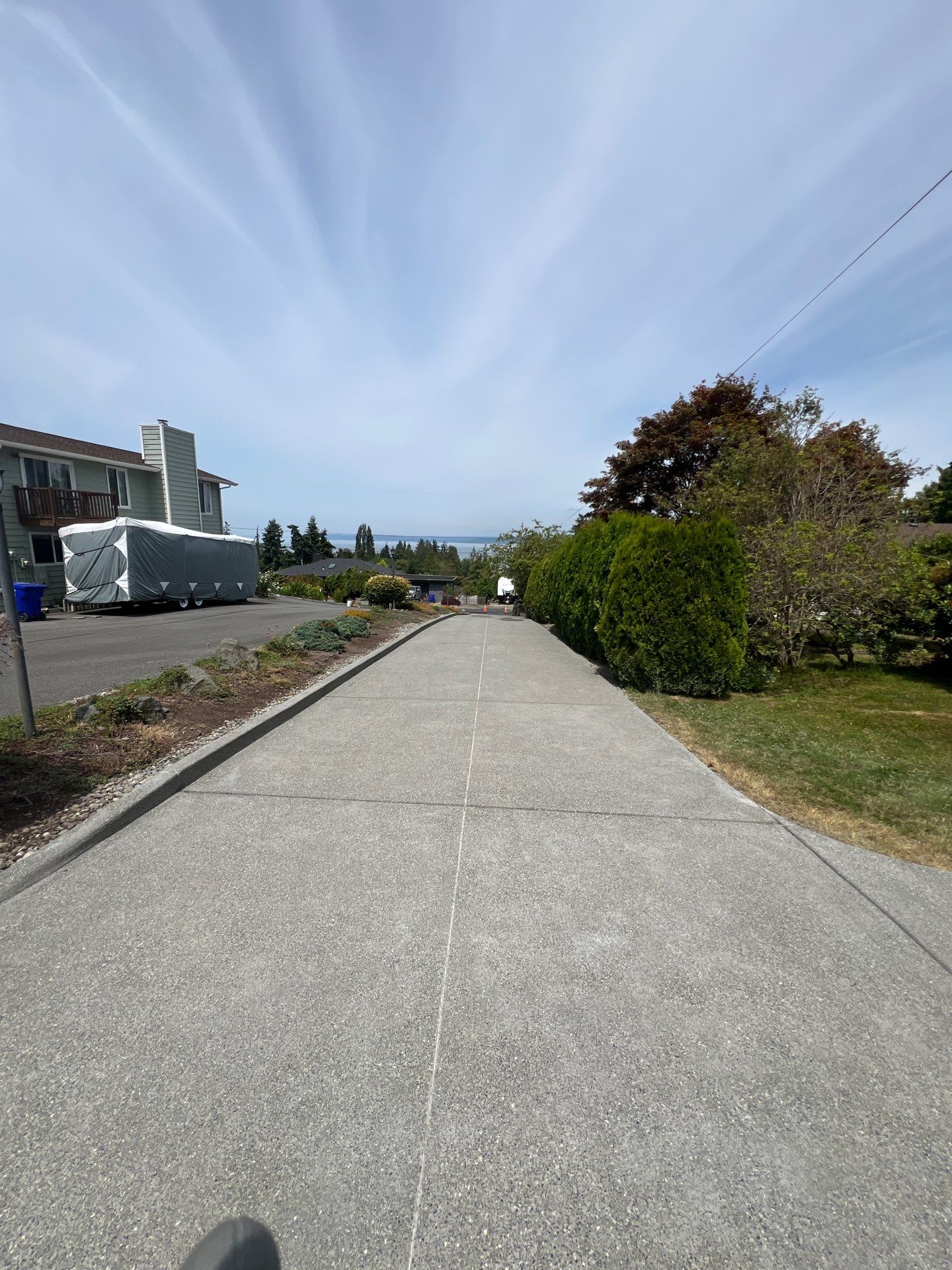 Concrete Driveway Makeover w/ Asphalt Patch | Everett  by Jireh Asphalt & Concrete Inc 