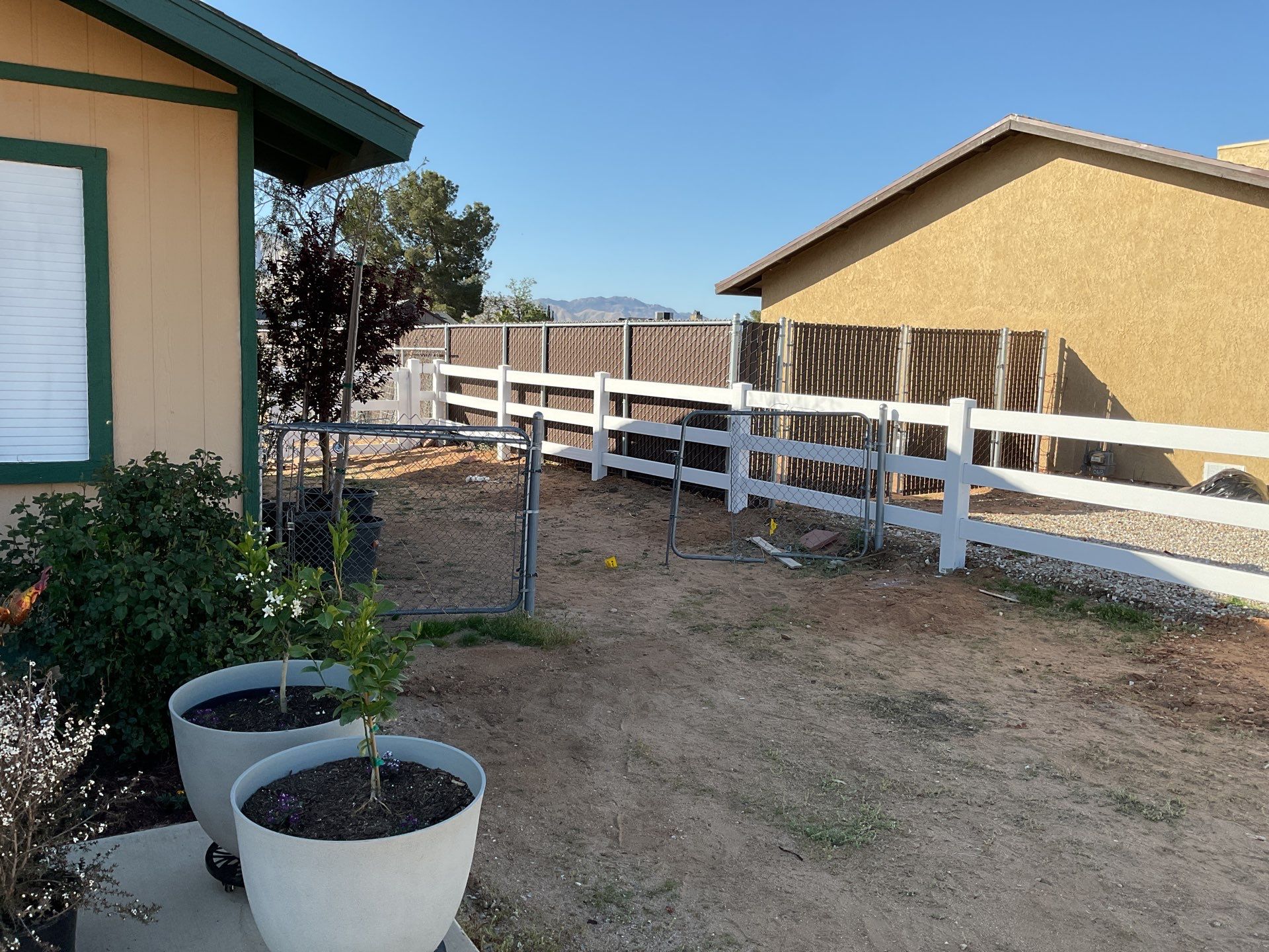 Fence Installation using Ranch Style Vinyl by Fence Guys Inc.