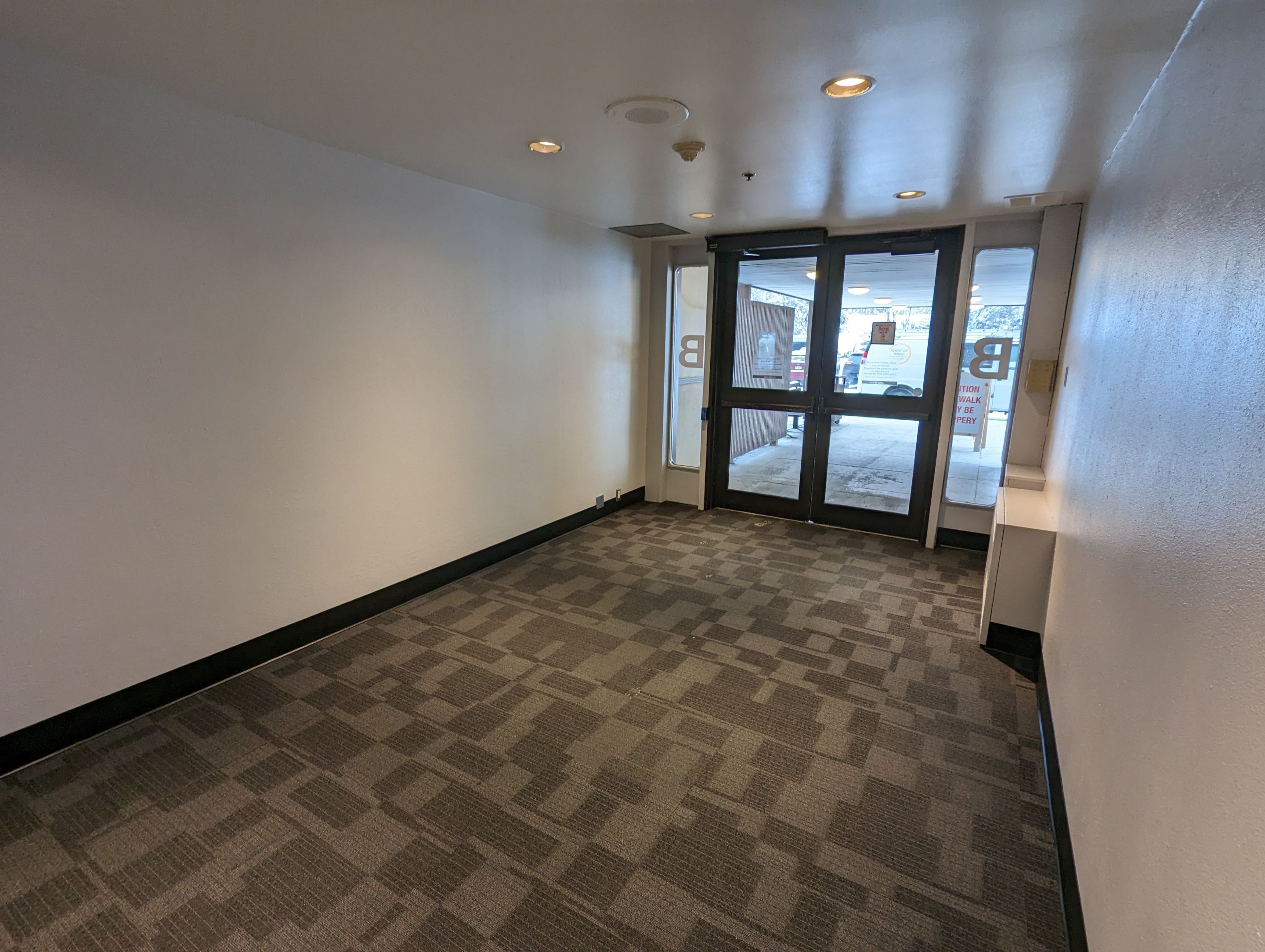 Business Entryway Gets New Paint! by Midnight Sun Painting