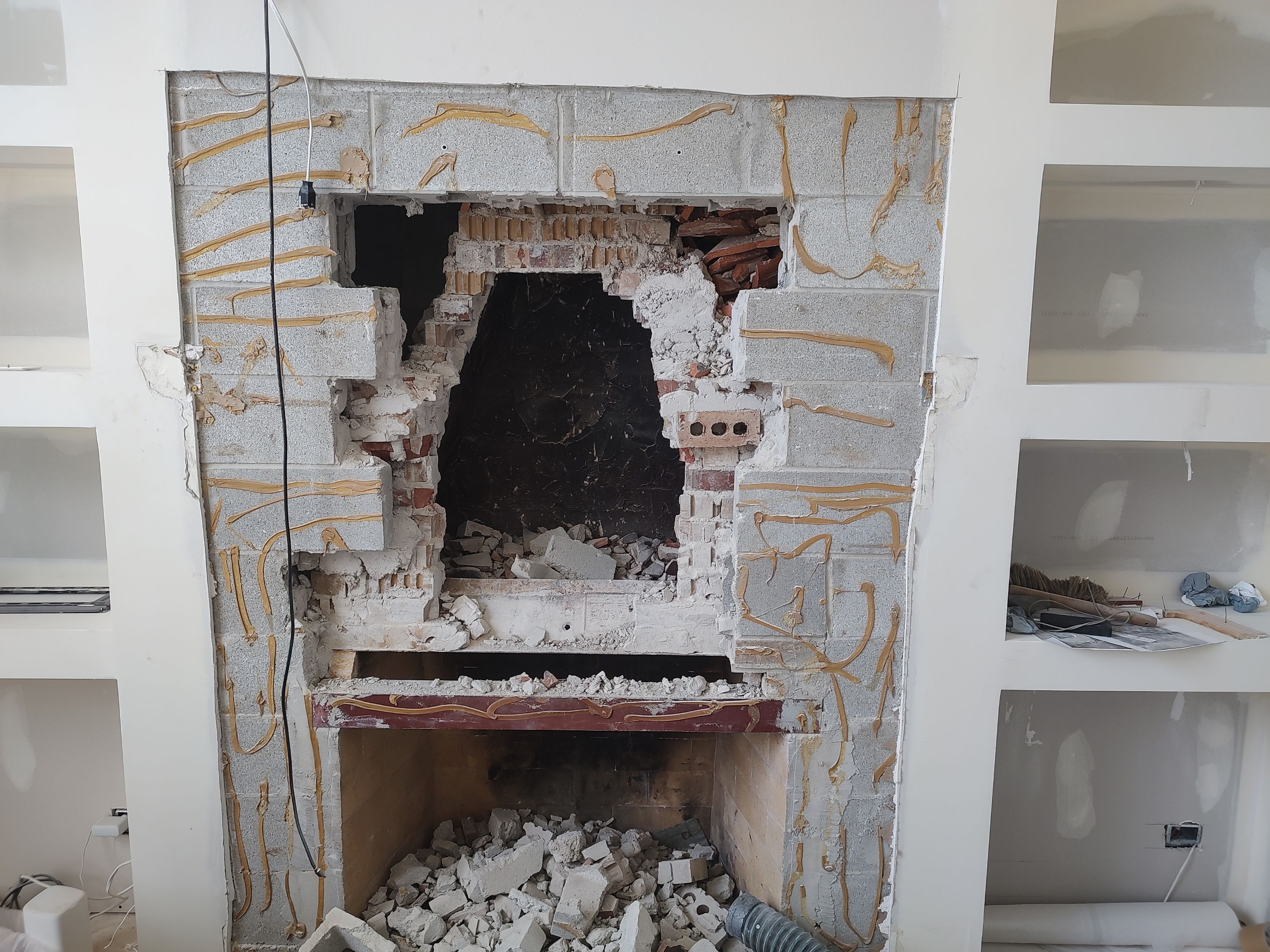 Firebox Rebuild & Stone Veneer Facing by Leonard and Sons Building Services, Inc.