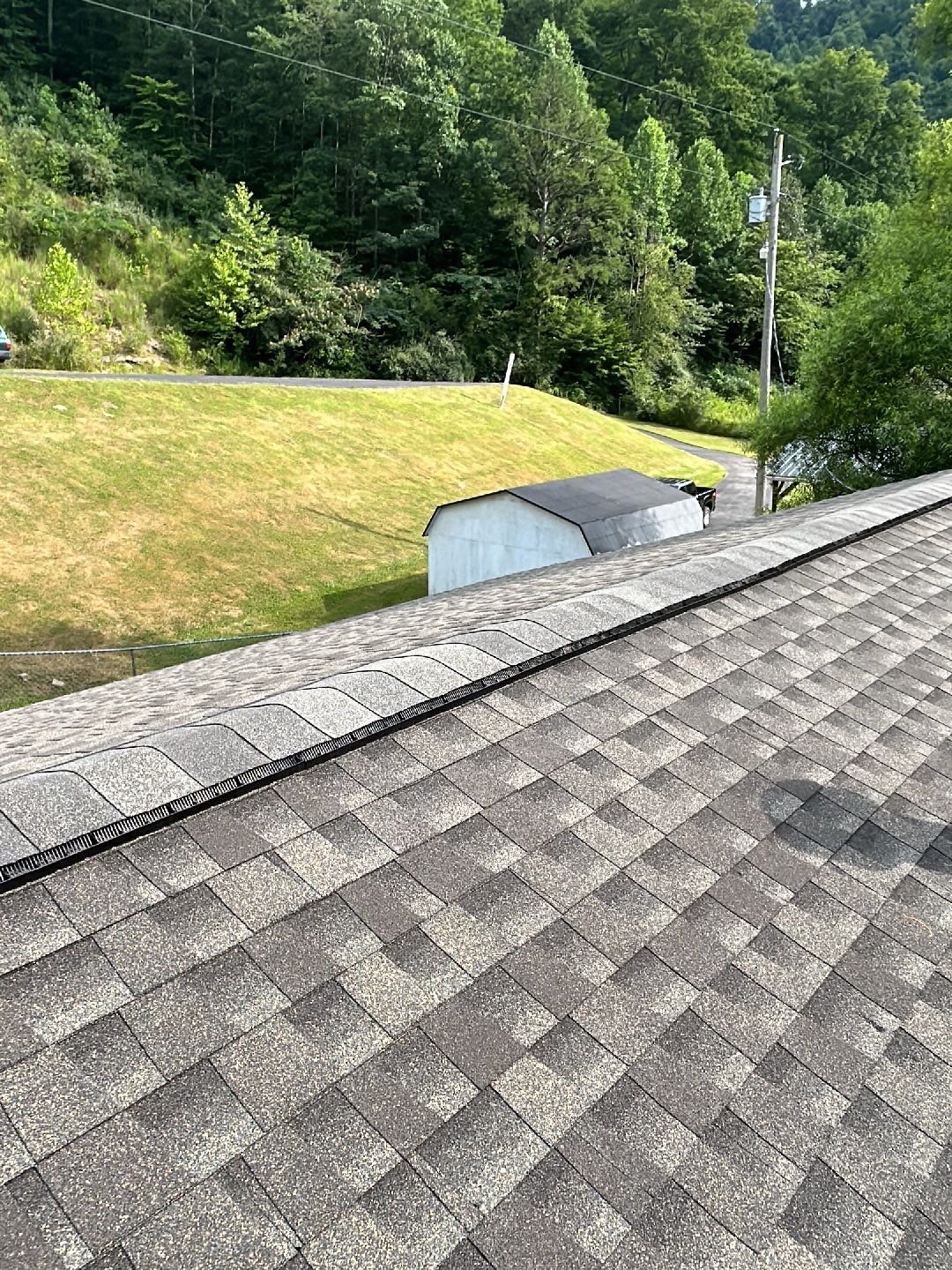 Residential Roofing Installation using Performance Shingles by Mr. Roofer