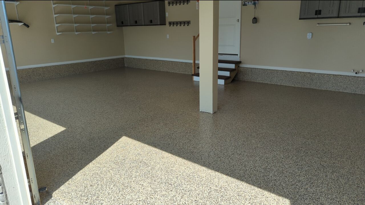 Garage using Cordwood by Select Painting, Coatings & Garage Cabinets