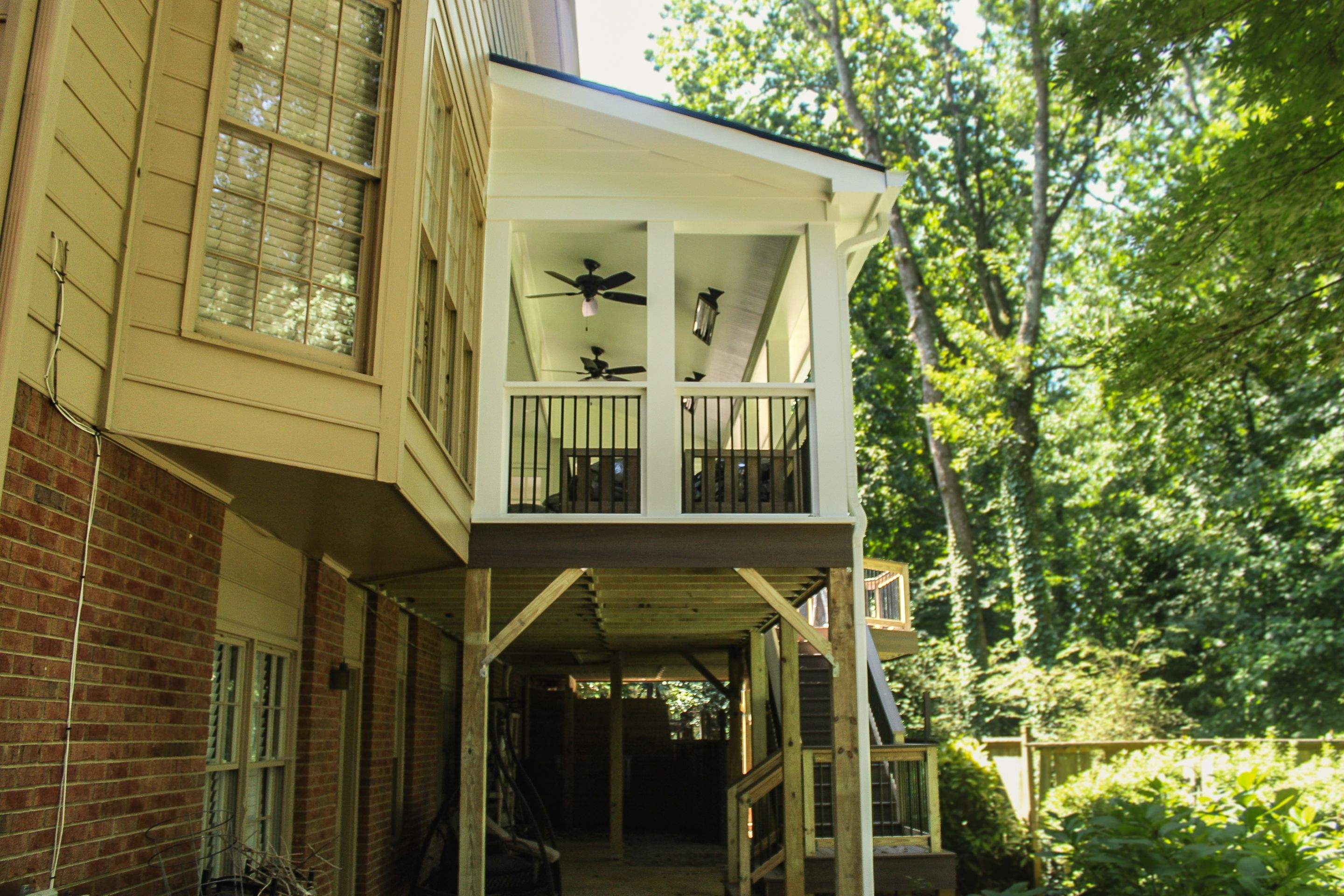 Deckorators Voyage Deck and Shed Style Covered Porch Build with Drink Rail by Nelson Exteriors 