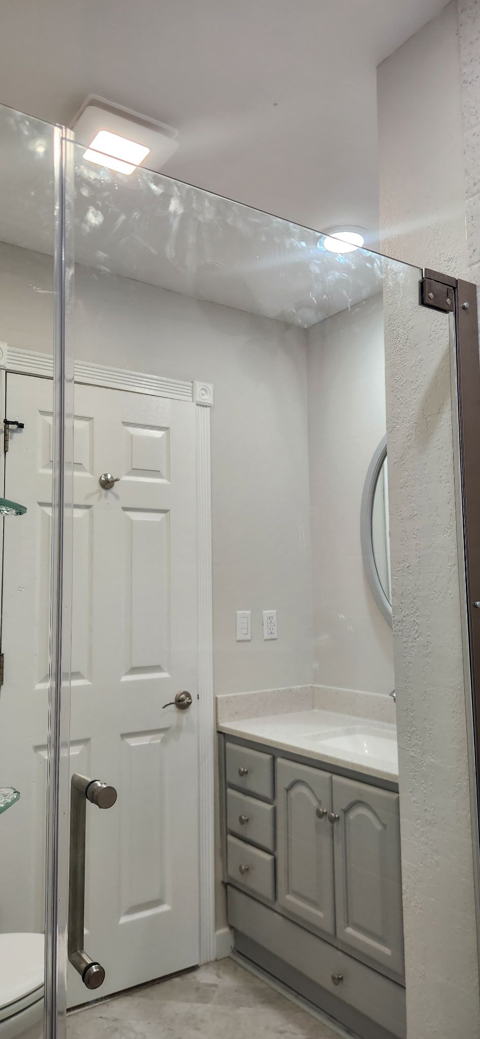 Small Bathroom Remodel by Cornerstone Home Builders, LLC