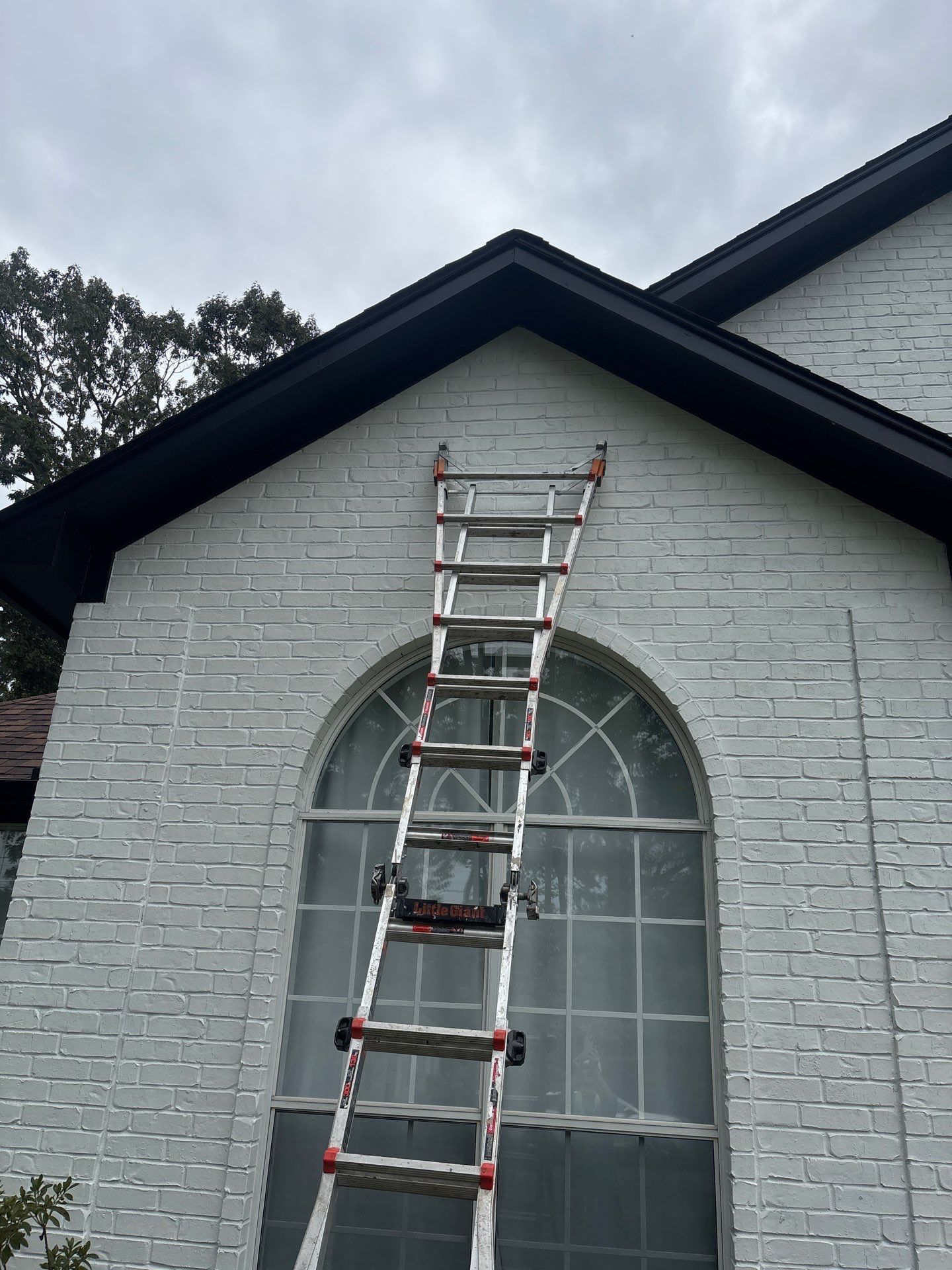 Project in TylerExterior Painting in Tyler, TX | White Brick Home, Varnished Fence & Shed Painting by Quality Coats Painting