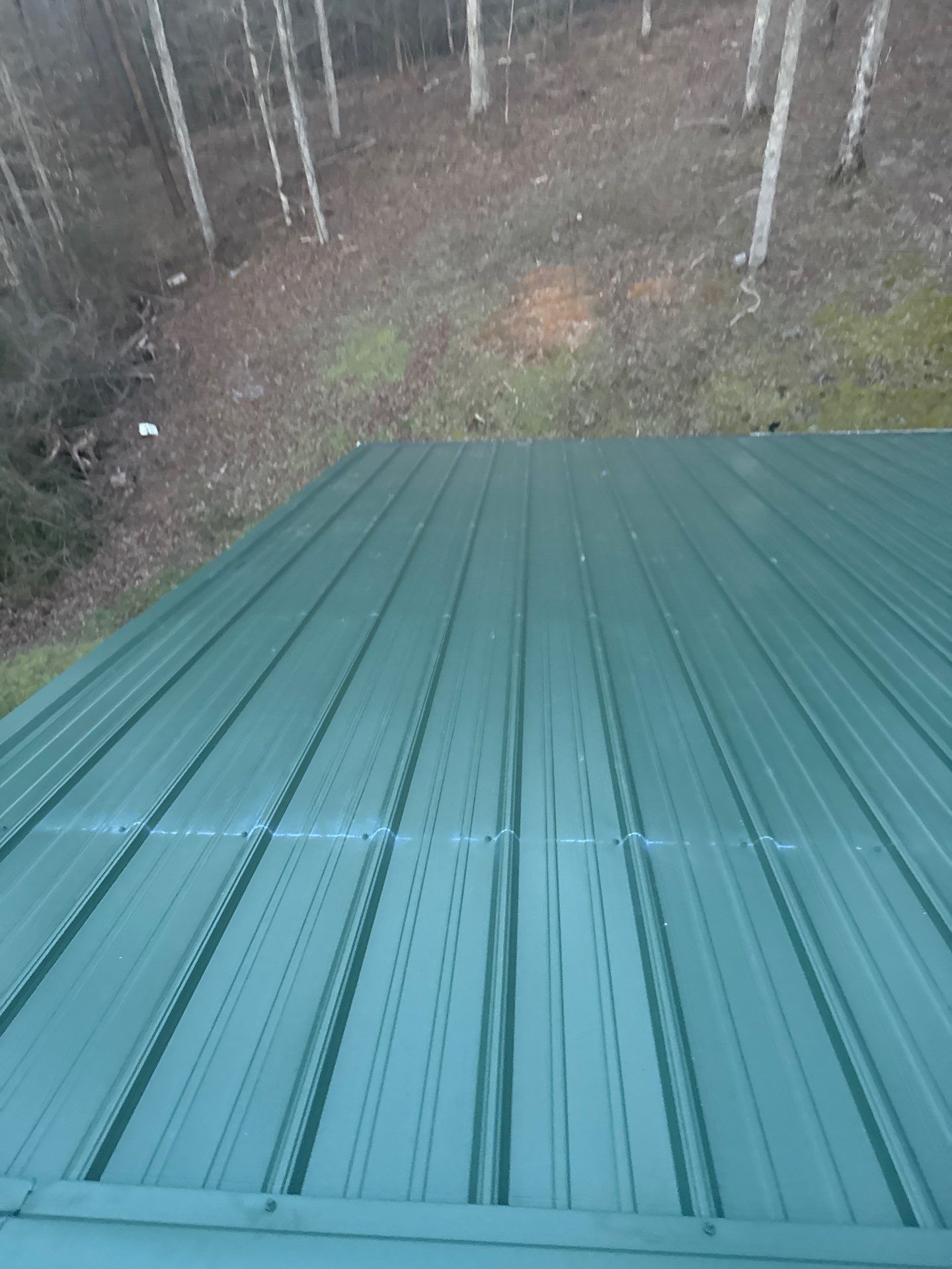 Metal Roof and Gutters Replacement in Hueytown by The Roofing Dudes