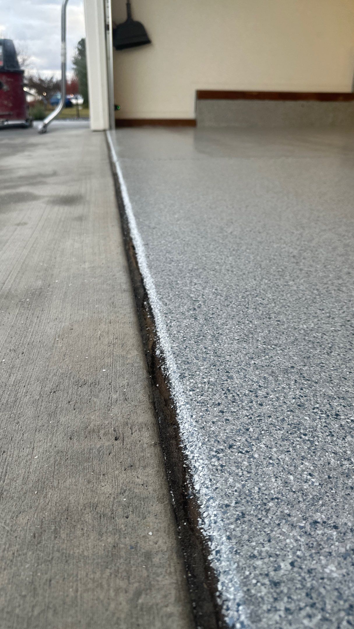 Garage Transformation using 1/8 Tidal Wave by Croc Coatings, LLC