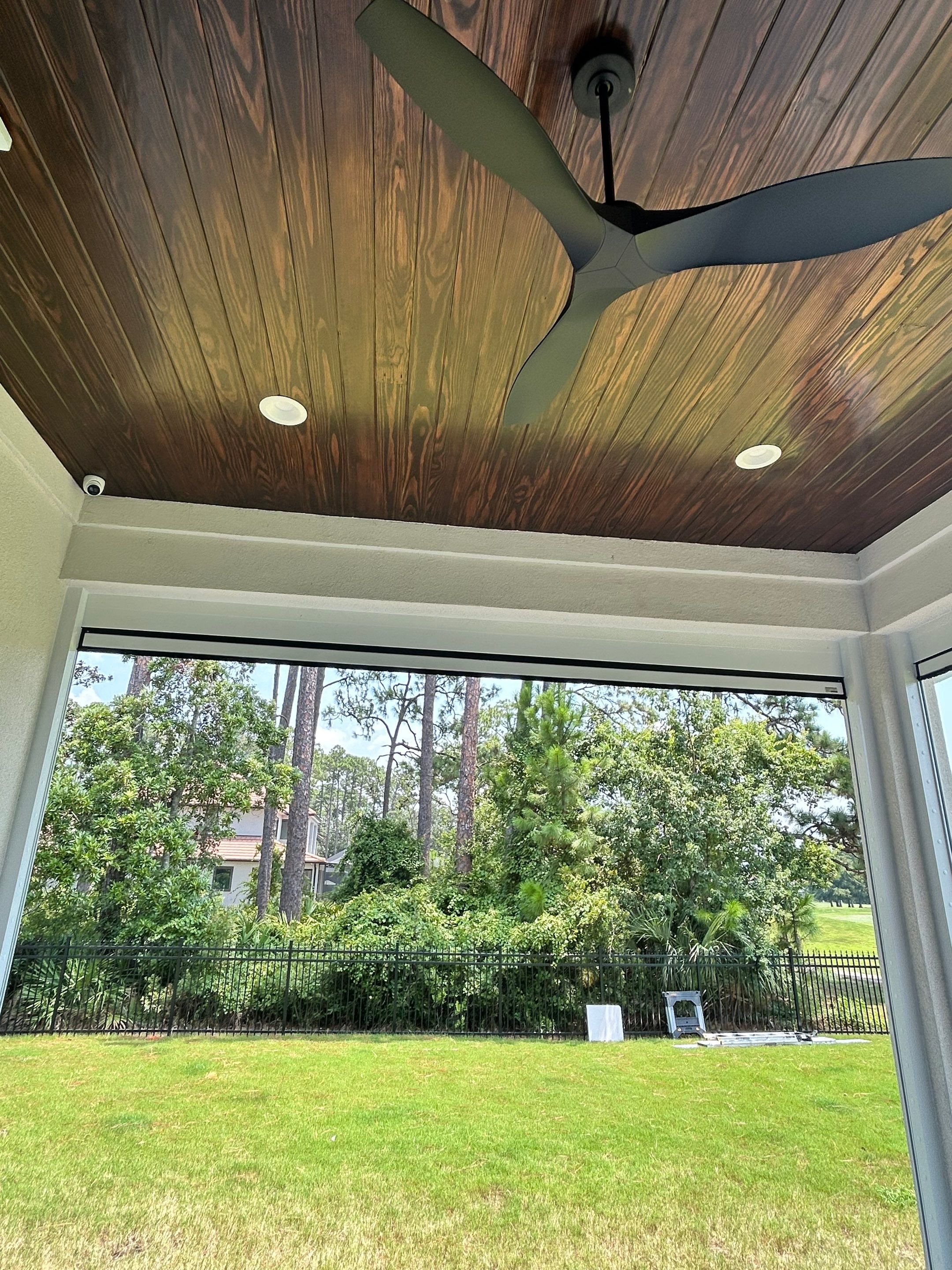 Motorized Screen and Solar Shade Installation in Panama City Beach by Brannan Aluminum Inc.
