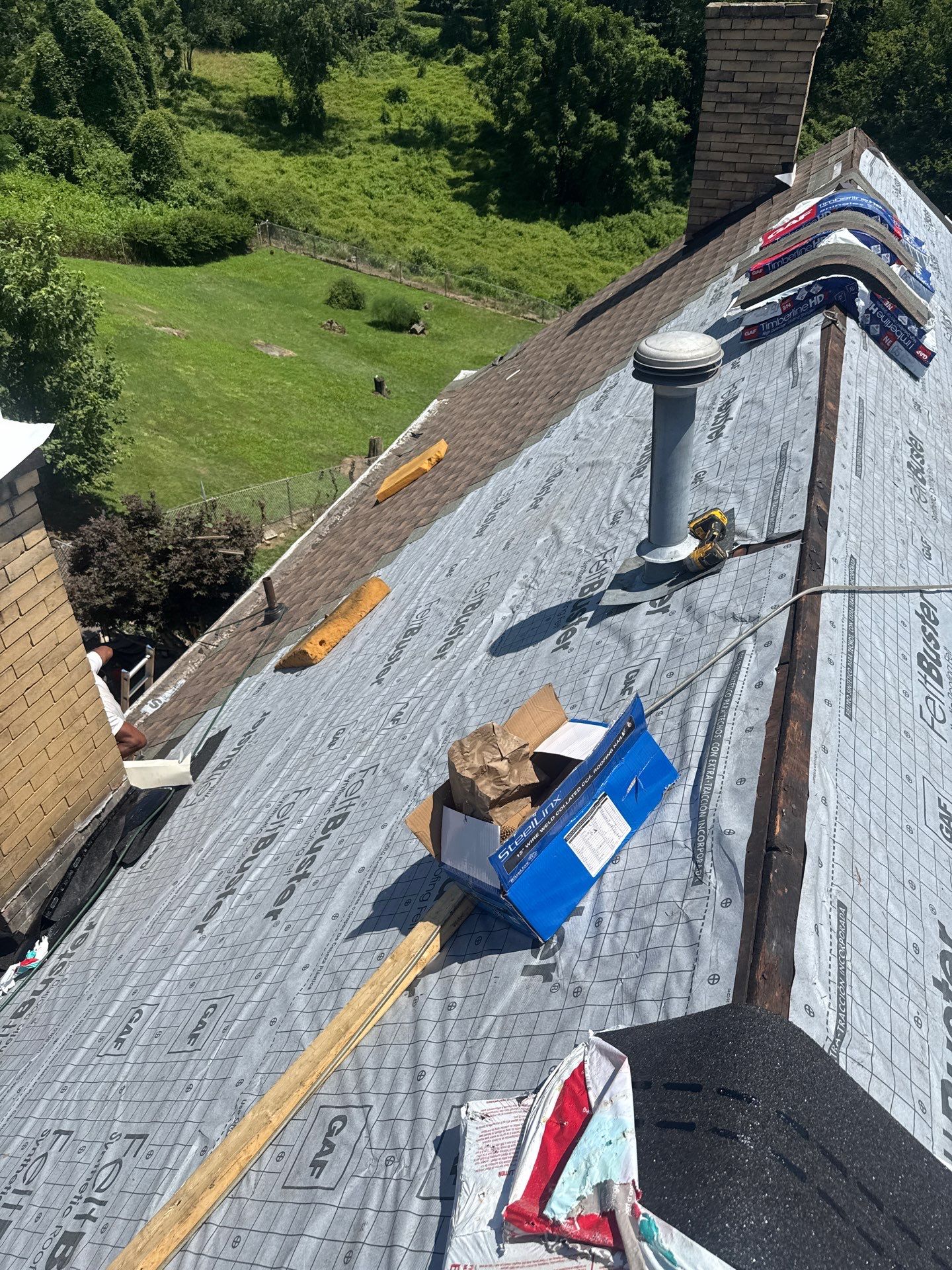 Residential Roofing Installation using GAF Timberline HDZ Barkwood by Rainstoppers Roofing