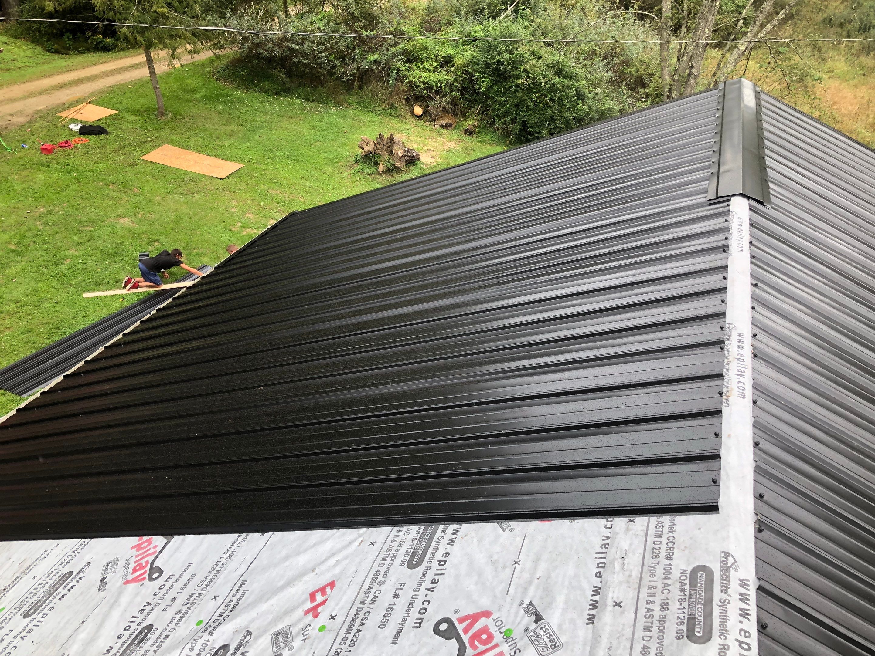 Metal Roof and Vinyl Siding, Soffit, Gutters using LifeTite Premium metal roofing  by Secure Construction Company Inc