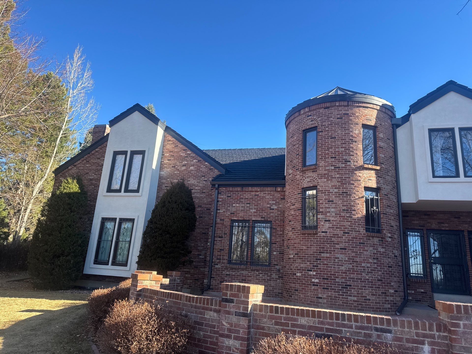 Unified Stone Coated Roof & Stucco Remodle by Blue Peaks Roofing LLC