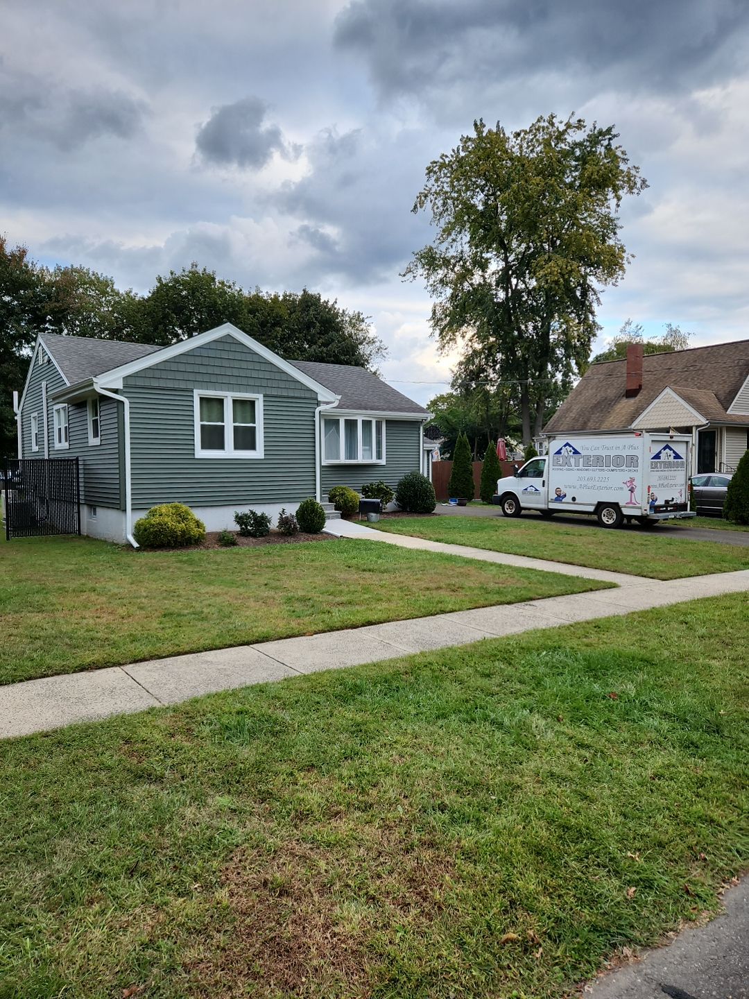 Siding Installation using Certainteed Monogram Forest Green by A Plus Exterior