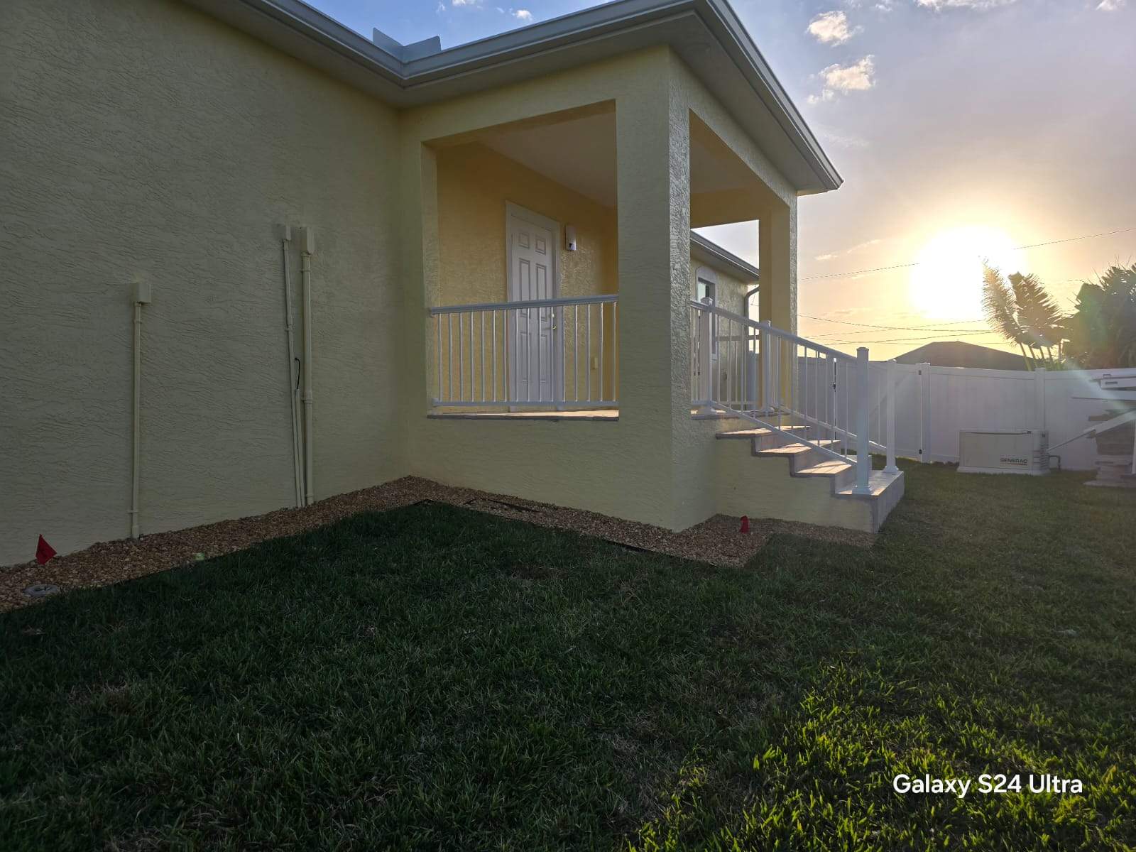 Vinyl Privacy Fence and Porch Railing Installation in Port Charlotte by True Fence LLC
