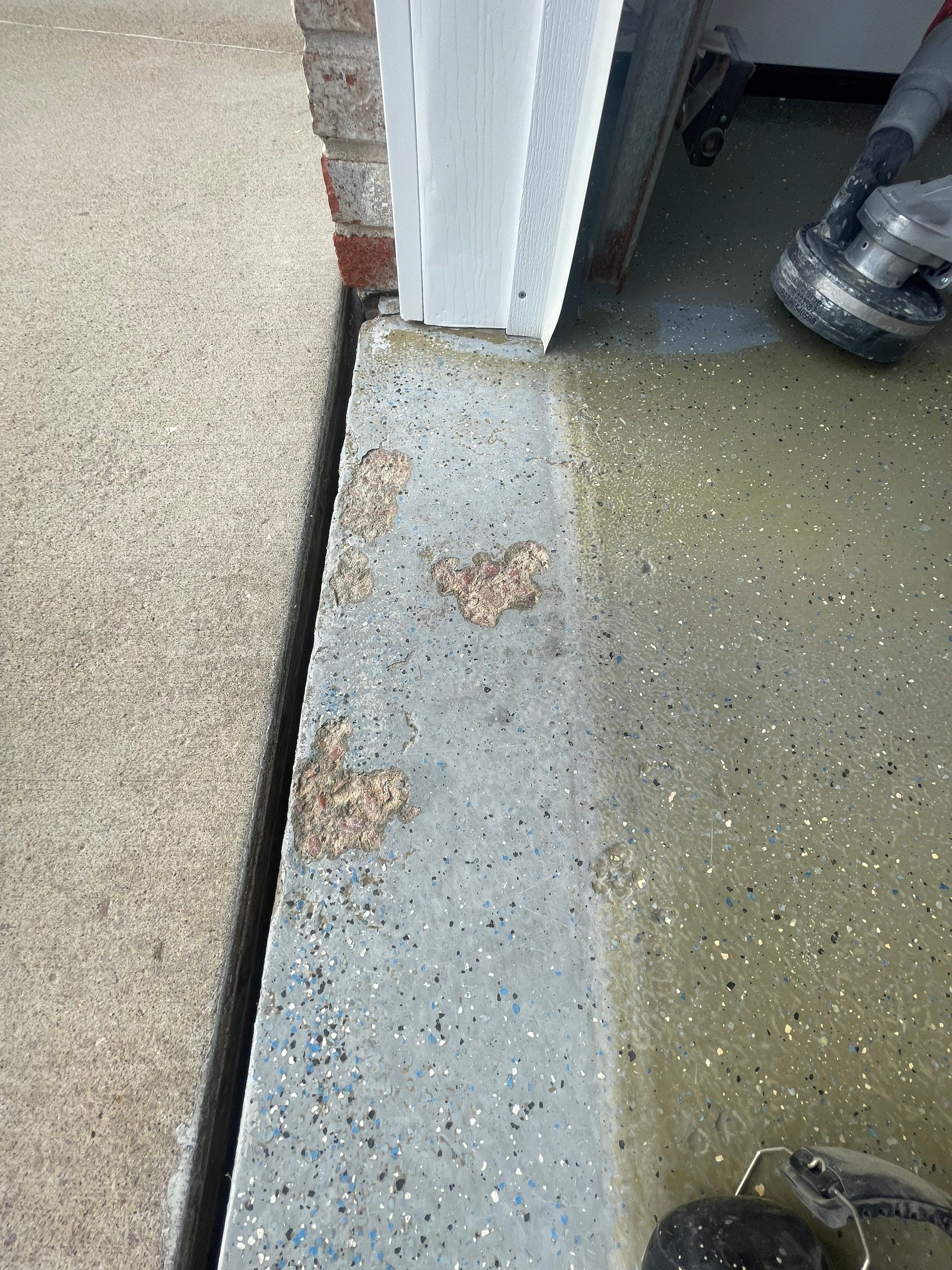 Multi-Car Garage Concrete Coating with Coyote Flake Finish in Sioux Falls by Select Painting, Coatings & Garage Cabinets