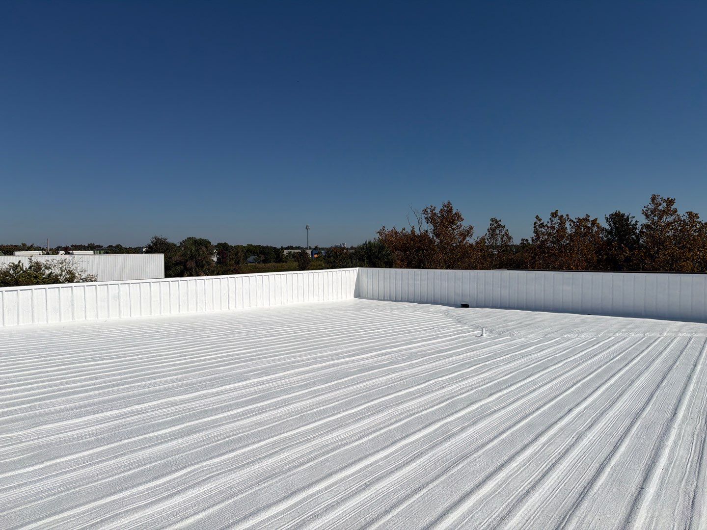 Orlando Commercial Metal Roof Restoration and Silicone Coating System by CES Roofing