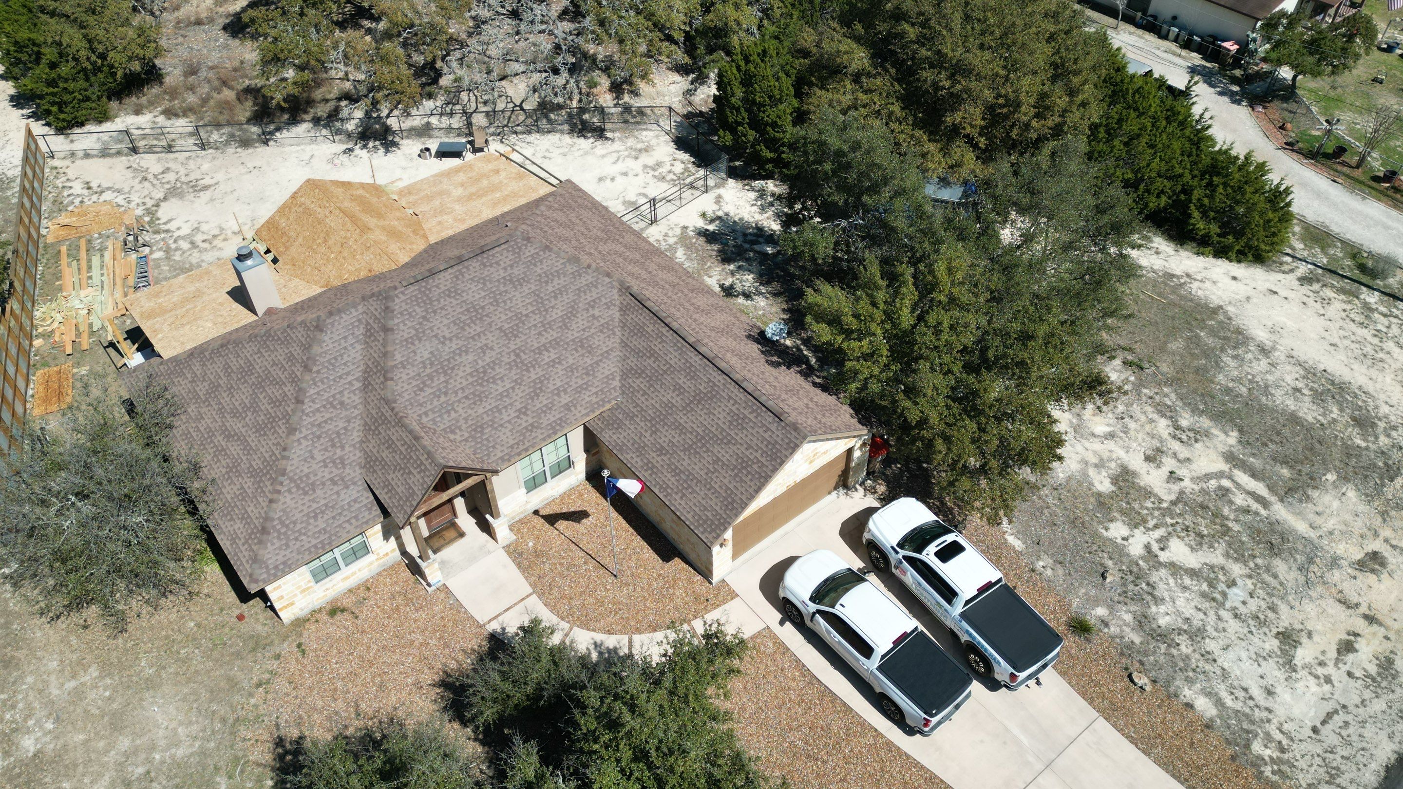 Reroof with Back Patio Addition using Owens Corning Duration Aged Copper by Lightning Exteriors