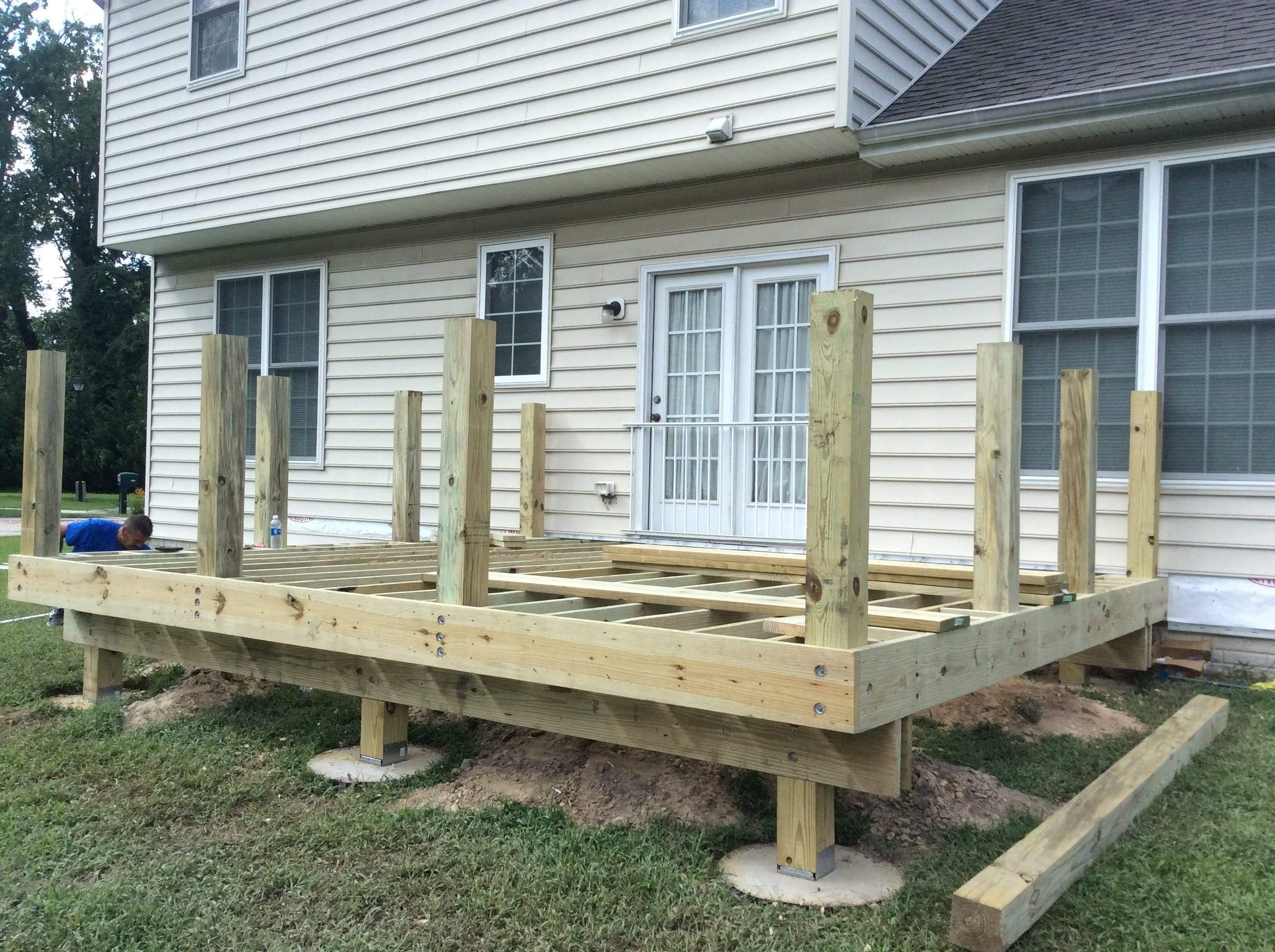 Deck Installation using New Composite Deck Board by Alpha Design Services