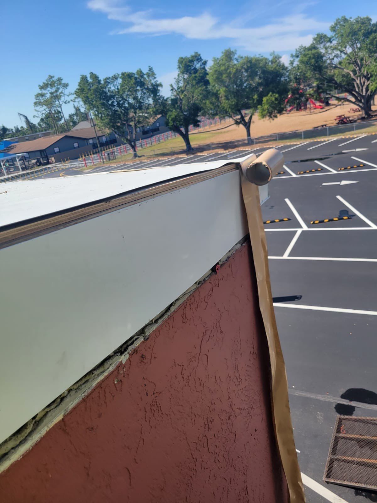 Emergency Repair on School from Storm Damage by Four Peaks Roofing
