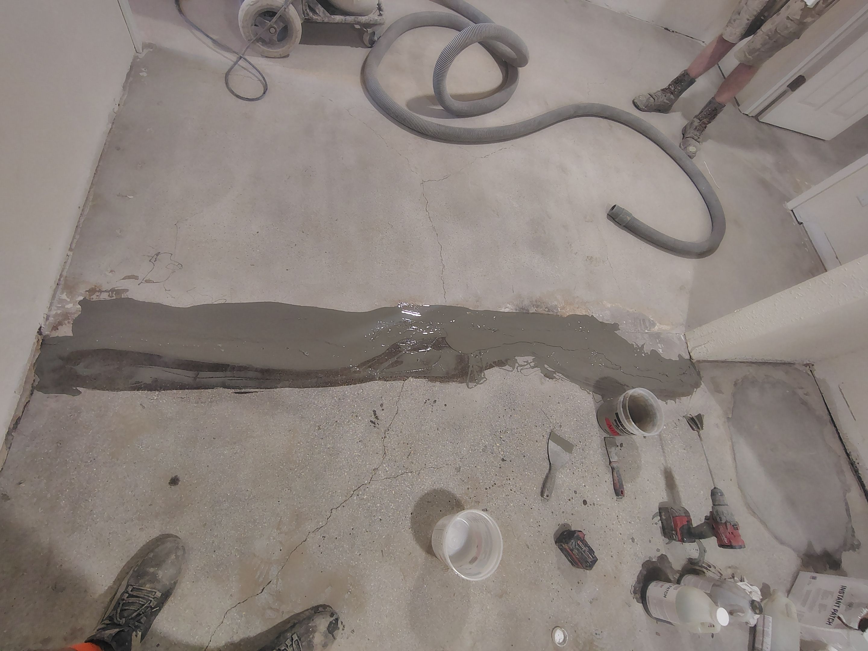 Comprehensive Basement Concrete Floor Coating and Crack Repair in Sioux Falls by Select Painting, Coatings & Garage Cabinets