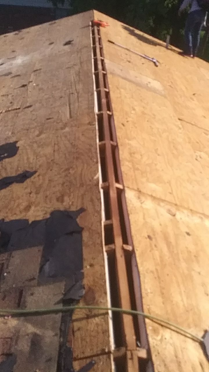 Residential Roofing Installation using Roof Replacement by American Roofing & Construction LLC