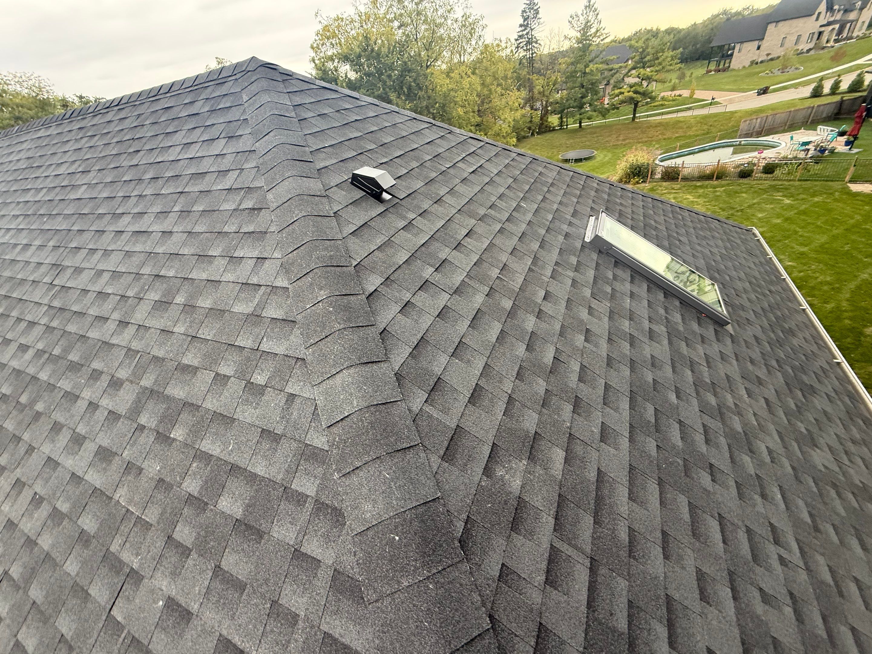 Roof and windows by Optimal Home Improvement 