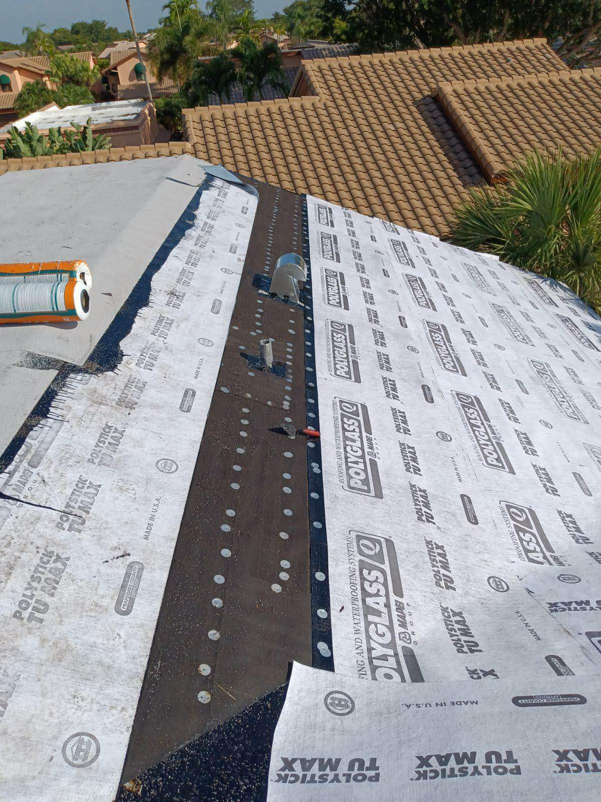 Complete Chimney Rebuild + Tile & Flat Re-Roof  by Morton Roofing, Inc.