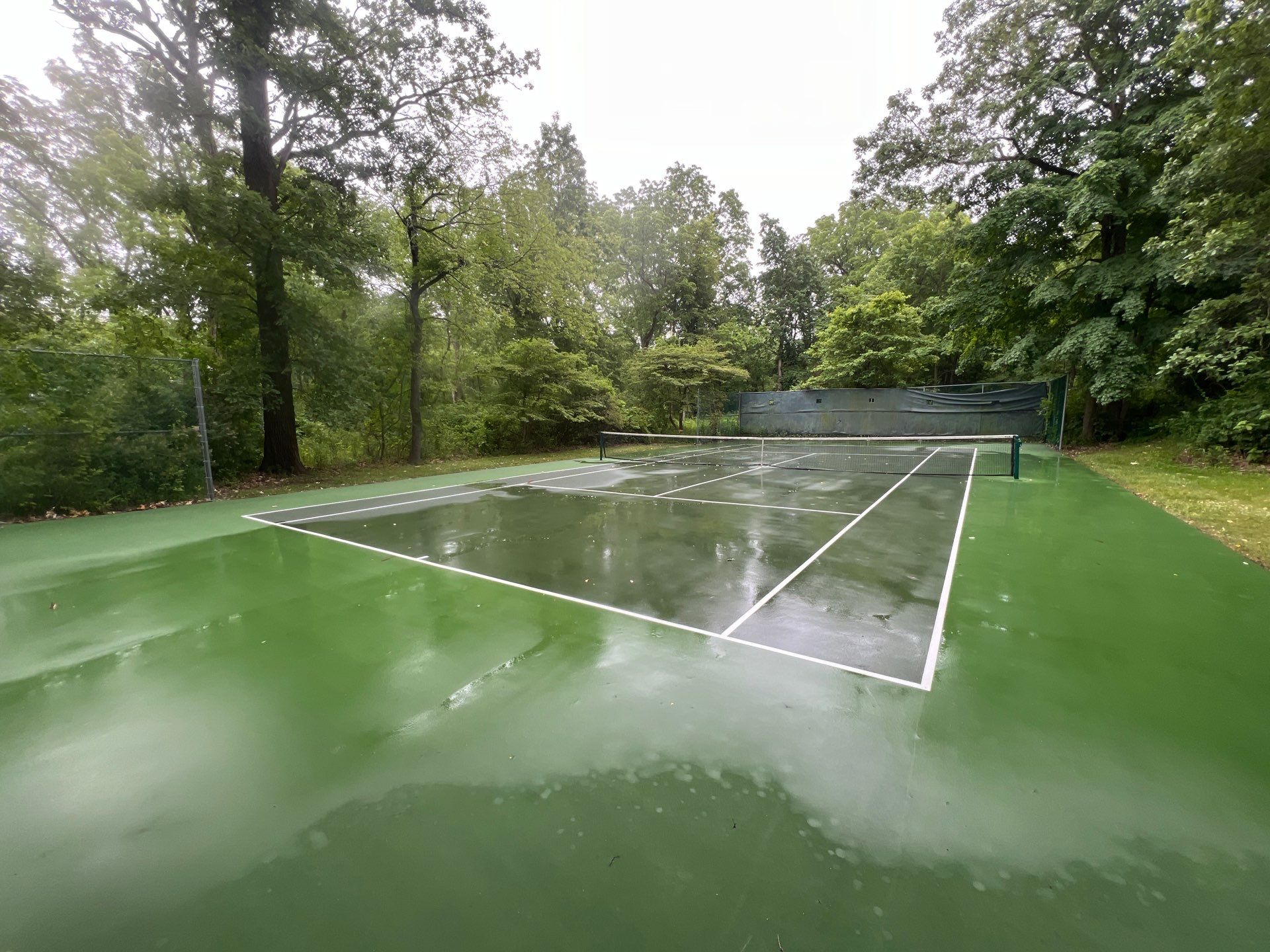 Deck, Patio, and Tennis Court Cleaning by Northern Power Washing LLC.