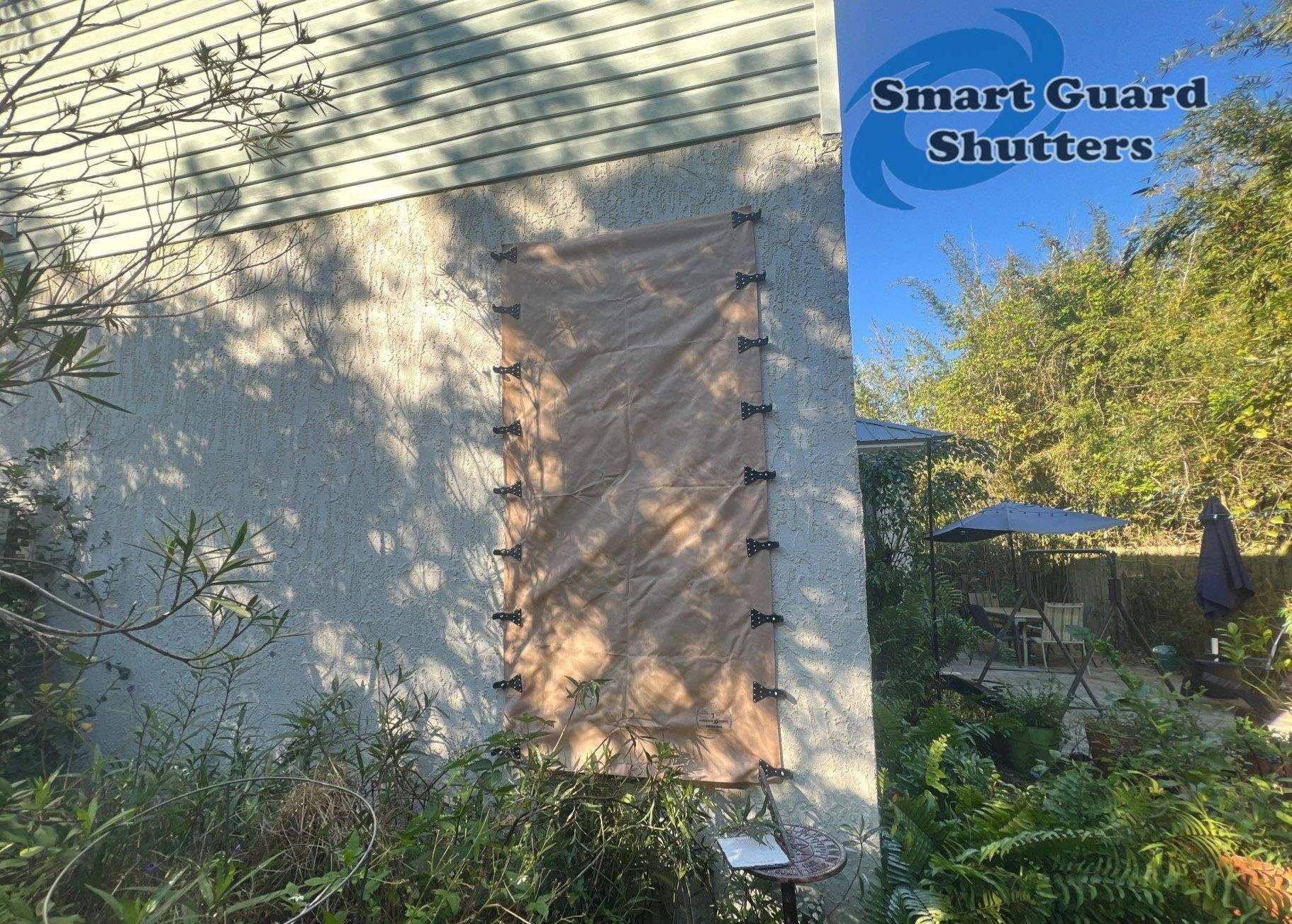 Hurricane Protection in Tan  by Smart Guard Shutters
