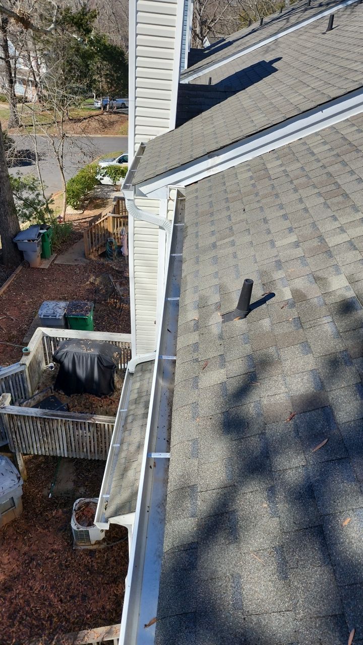 Gutter Cleaning using water by Power Wash Masters LLC
