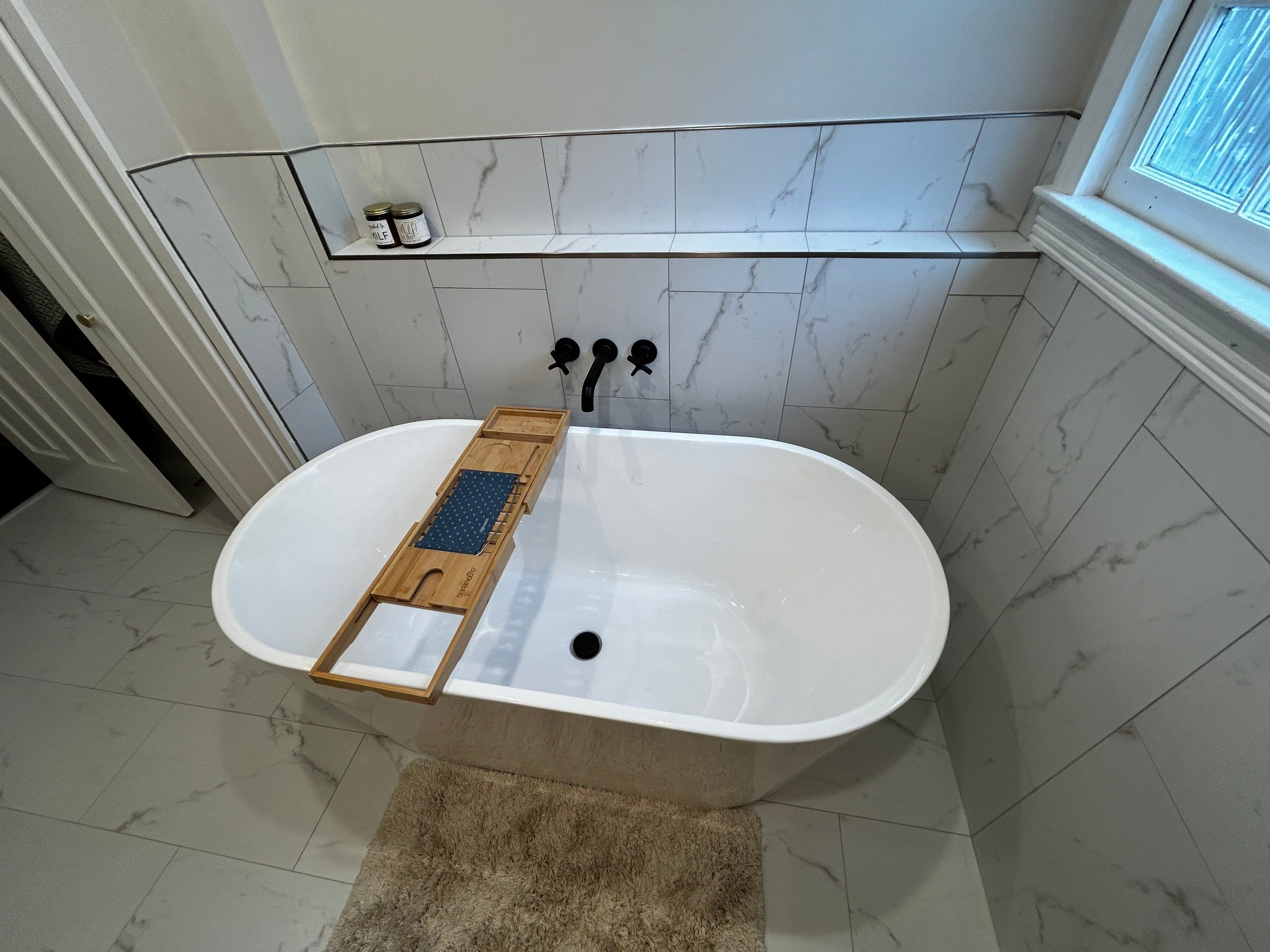 Spa like bathroom by Footprints Bath and Tile of East Atlanta