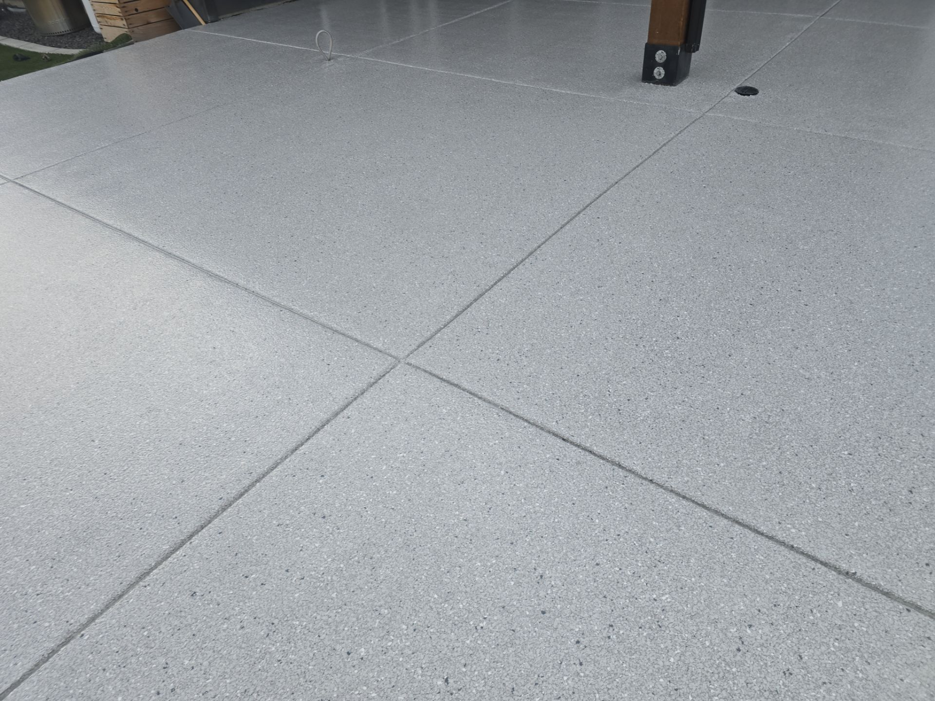 Custom North Pole Flake Coating for Post Falls Patio and Porch by Croc Coatings, LLC