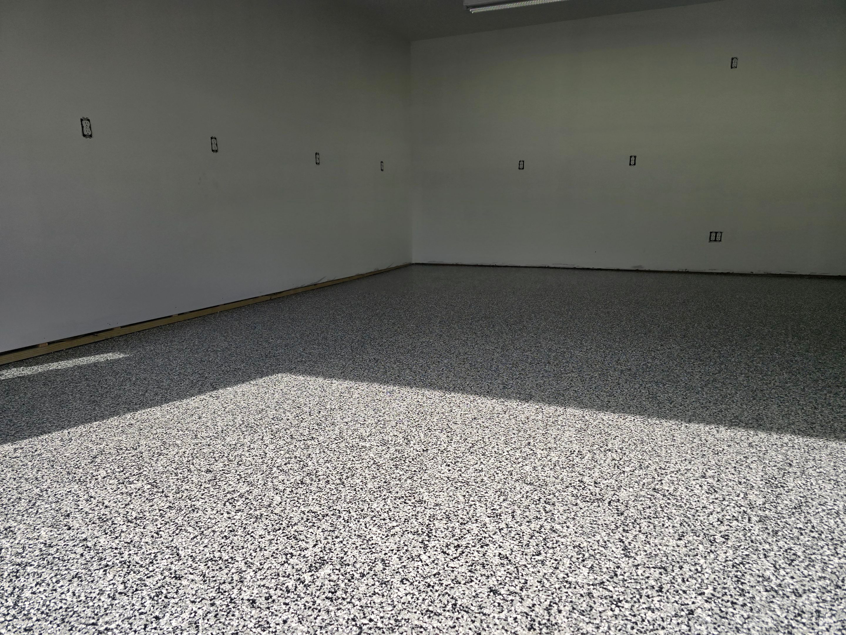 Garage using Domino by Elite Floor Solutions