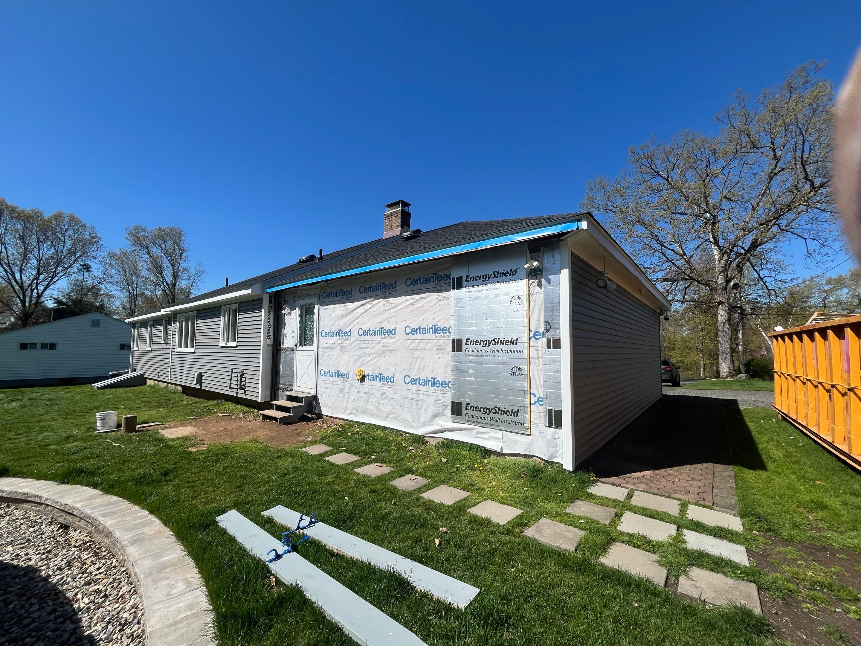 Refreshed Siding with Cert Monogram D/4 x 16'8" clapboard Charcoal Gray & Cert Monogram D/4 x 25' clapboard Charcoal Gray by DiGiorgi Roofing and Siding Inc