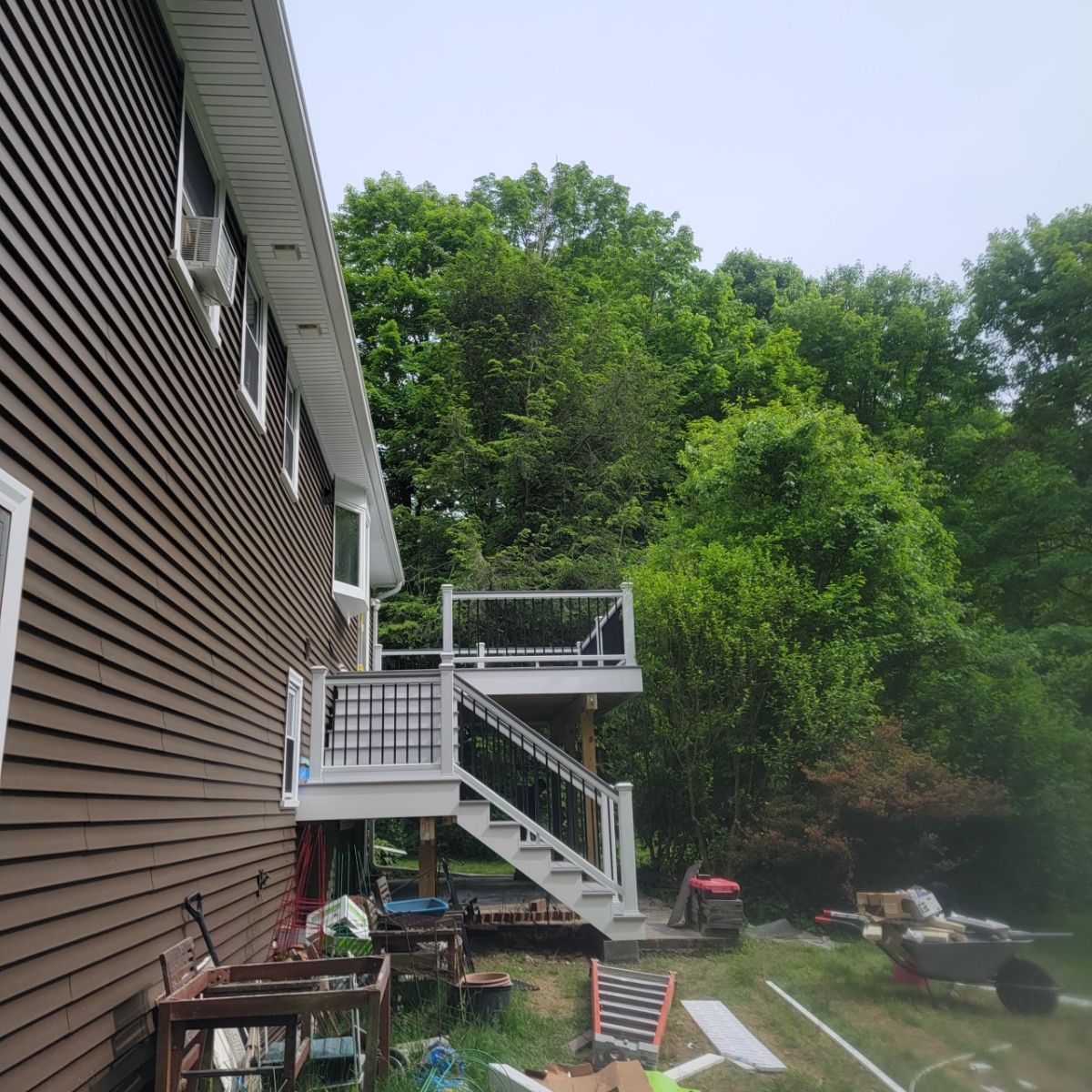 Deck replacement using Trex Lineage Rainier, Cocktail Rail, Rainescape by DiGiorgi Roofing and Siding Inc