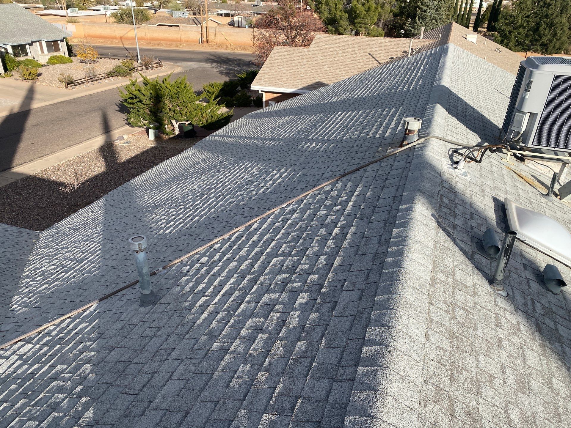 Onyx Black Shingles by Reimagine Roofing