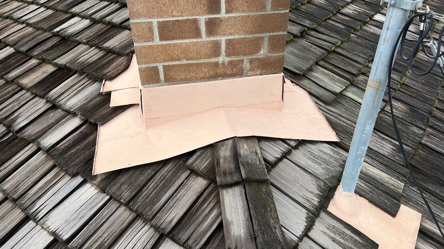 Installation of Certainteed Presidential shingles on residential house by Straight Edge Roofing Inc