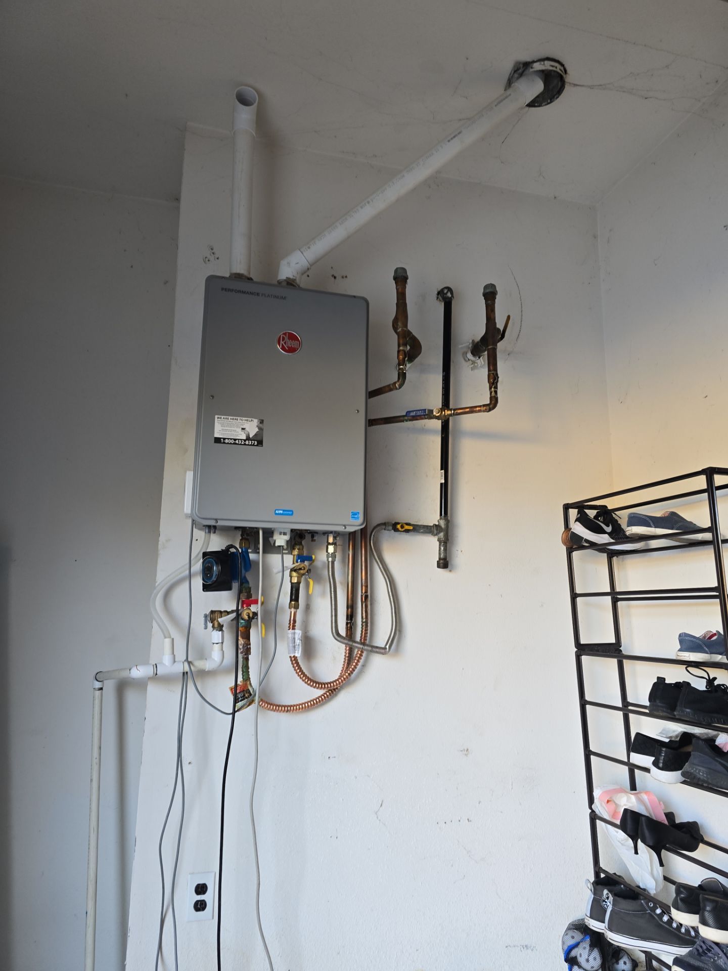 Installing a New Tankless Water Heater by Us Plumbing 