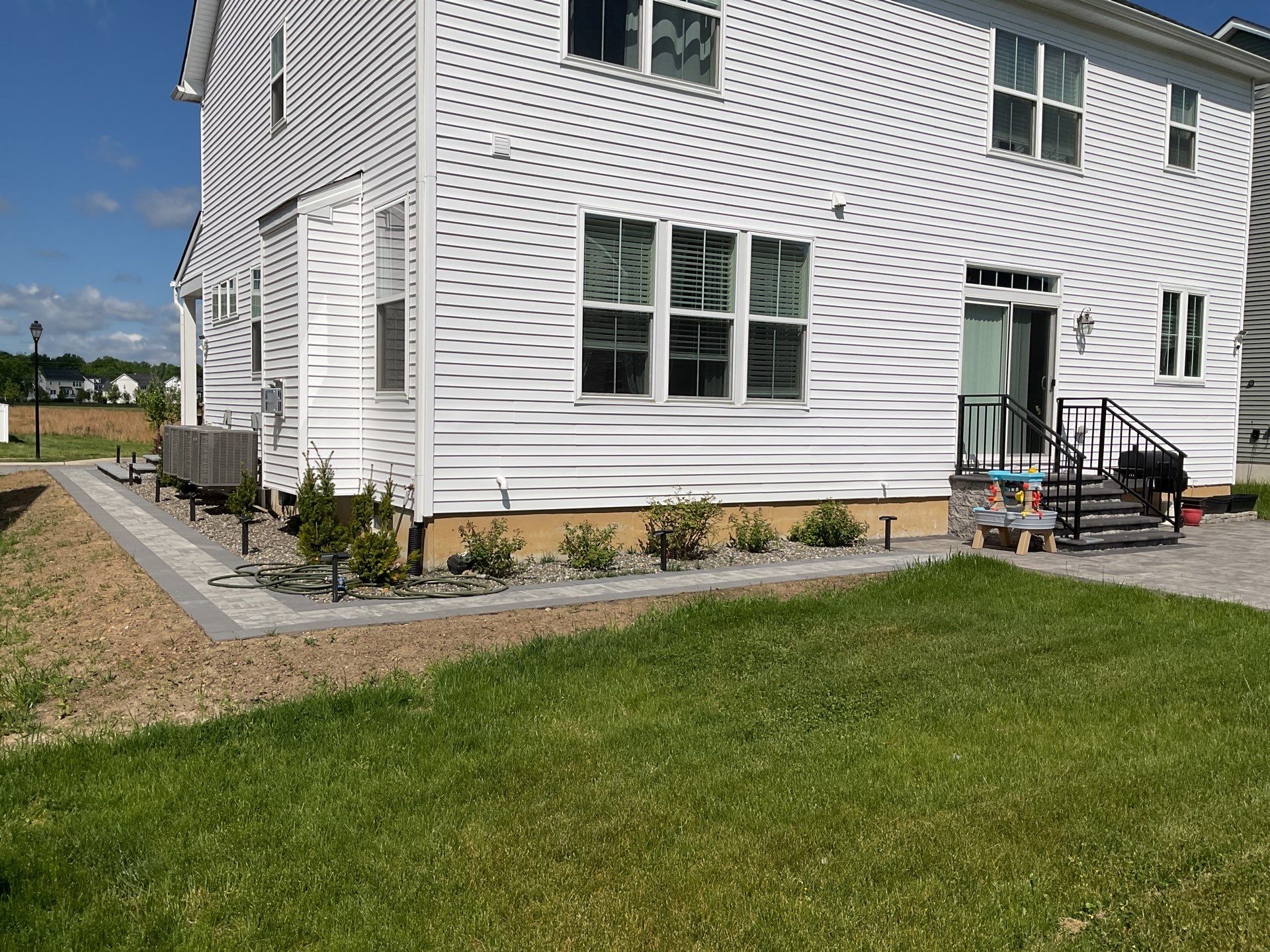 Custom Belgard Paver Patio Design & Installation in Delaware by Studio G Indoor Spaces & Outdoor Living