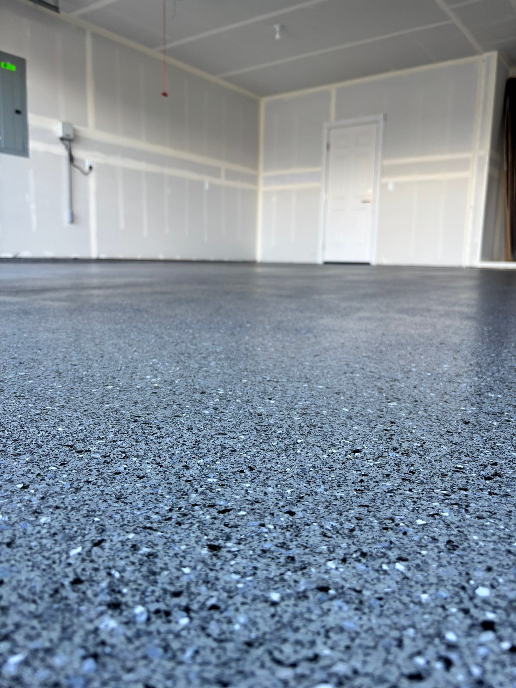 Garage Transformation using Slate Hybrid by Croc Coatings, LLC