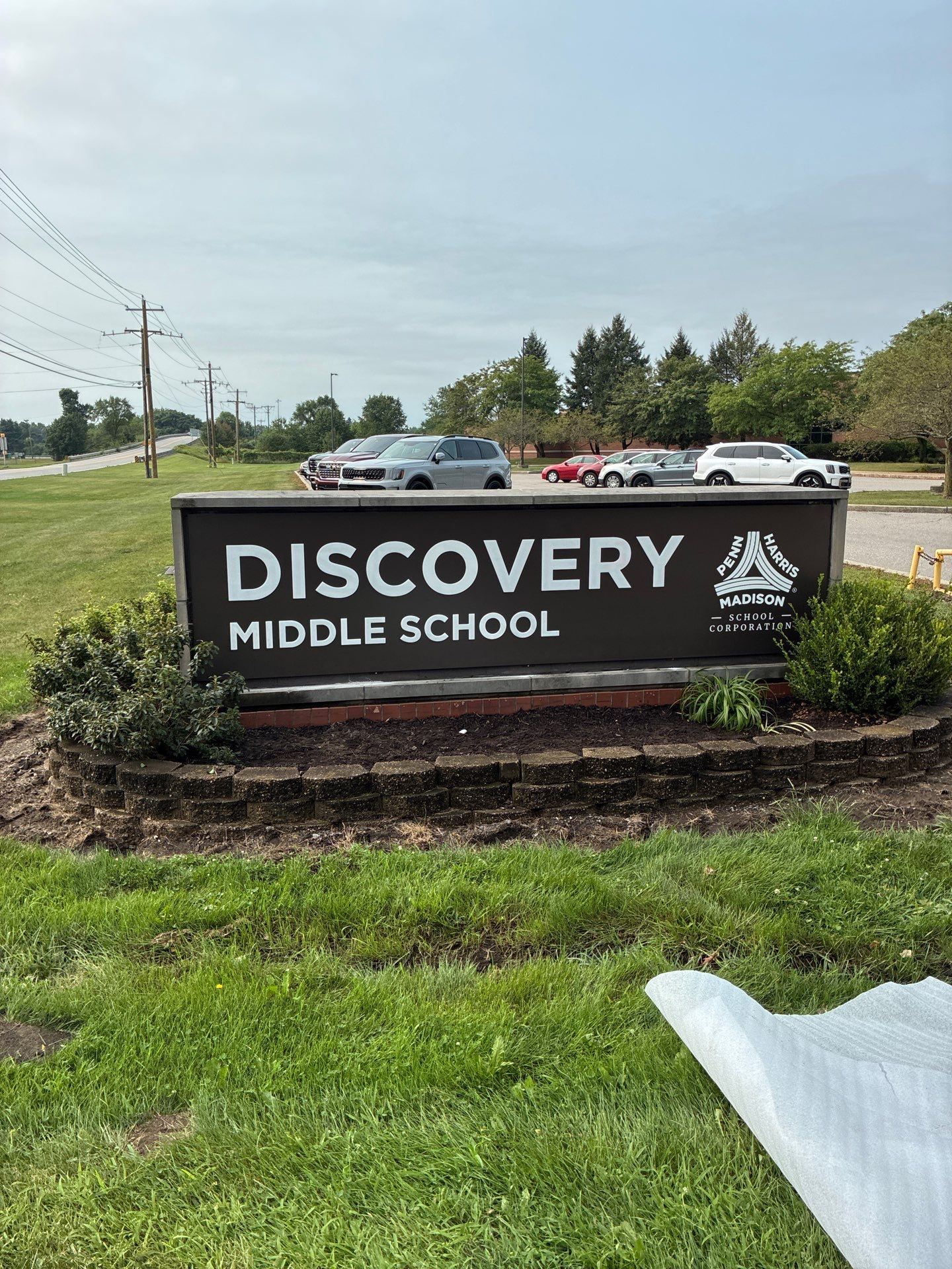 New Monument Sign and Stone Retaining Wall in Granger by Hayes Design co
