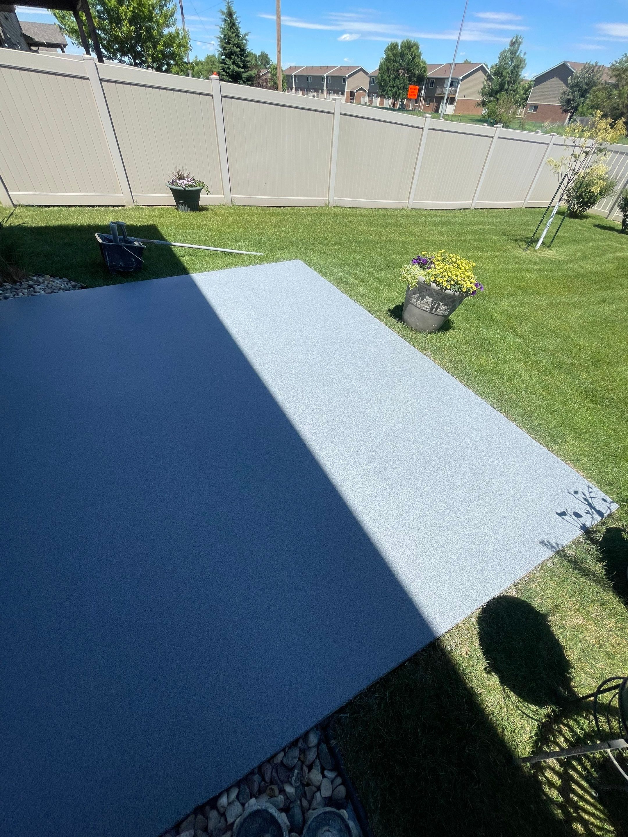 Custom Concrete Coating for Sioux Falls Patio and Front Walkway by Select Painting, Coatings & Garage Cabinets