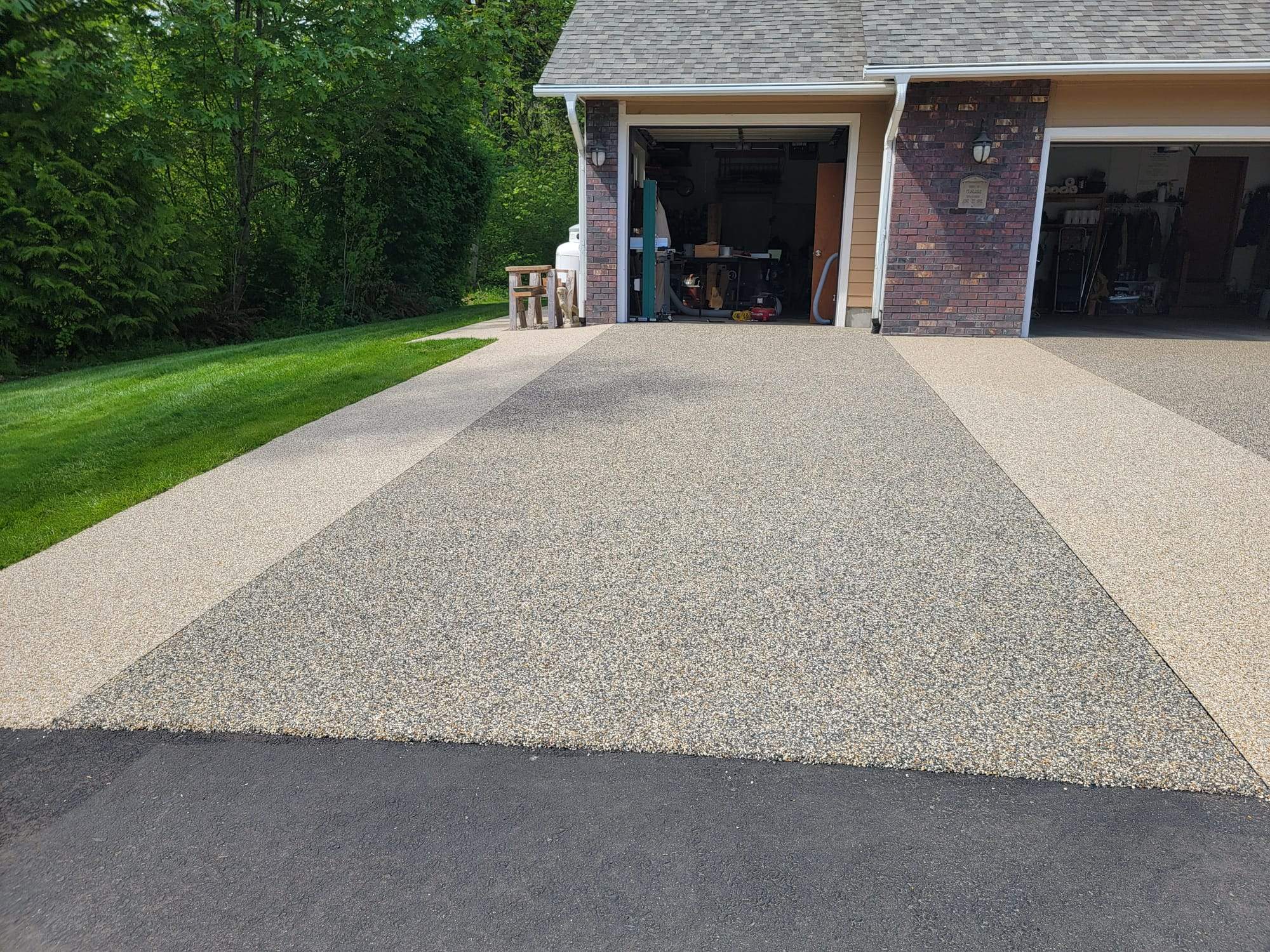 Luxury Driveway with Big Sur and Sistine Chapel Borders by Concrete Coating Experts Inc.