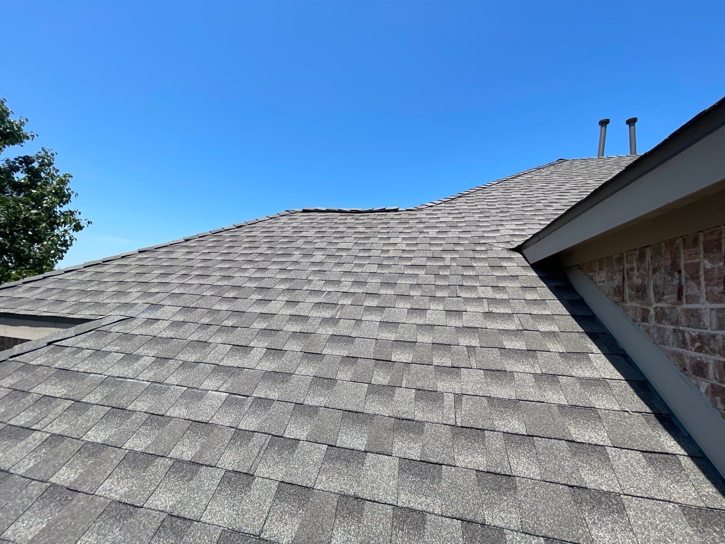 Major Hail Storm Full Roof and Gutter Replacement by First United Roofing & Construction