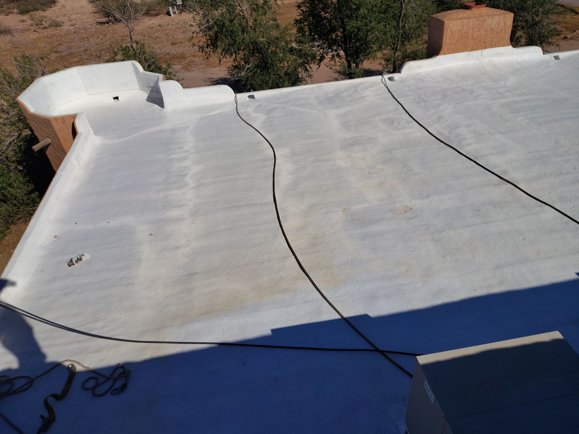 Residential roof application by SPF Services 