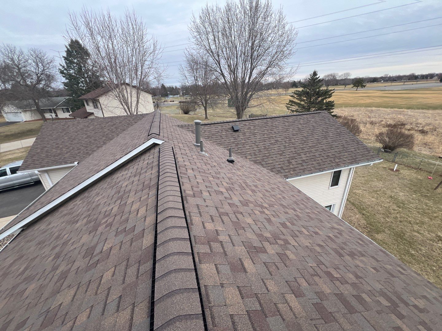 Hail Damage Roof Replacement – Owens Corning Duration in Teak | Cottage Grove, MN by First Impressions Exteriors